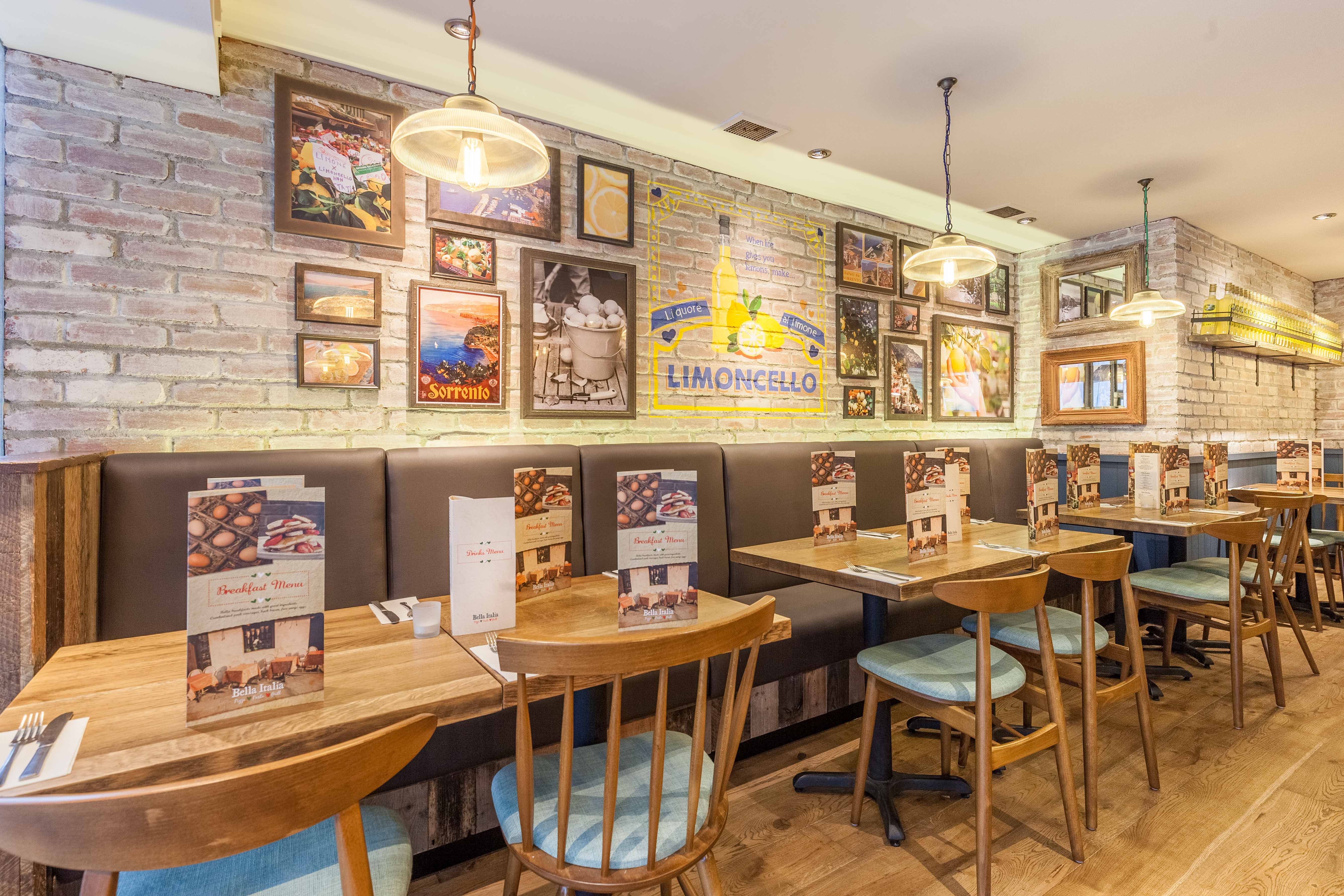 Cozy Bella Italia venue with warm lighting, perfect for intimate dining events.