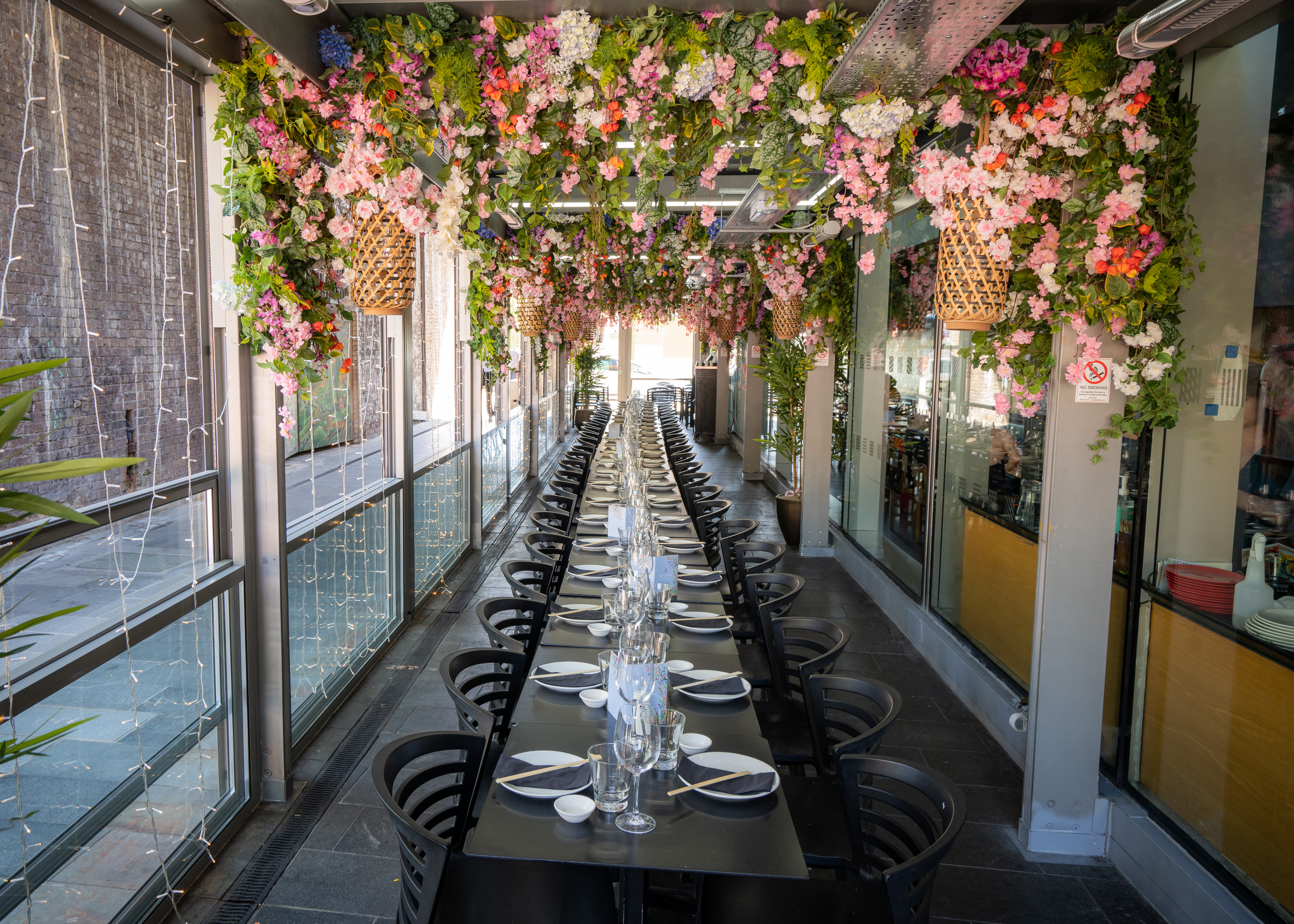 Cherry Blossom Private Terrace dining space with floral decor for elegant events.