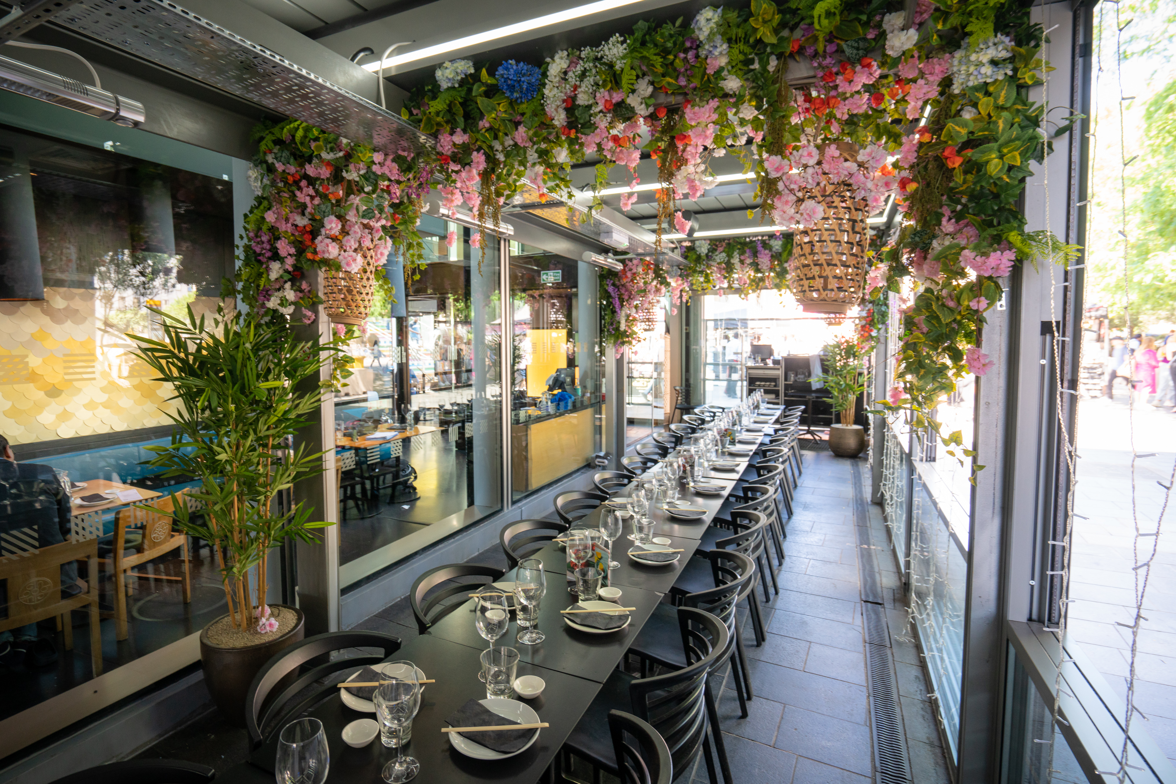 Cherry Blossom Private Terrace dining setup with floral decor, ideal for events and gatherings.