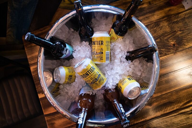 Stylish ice bucket with craft beers for networking receptions and casual gatherings.