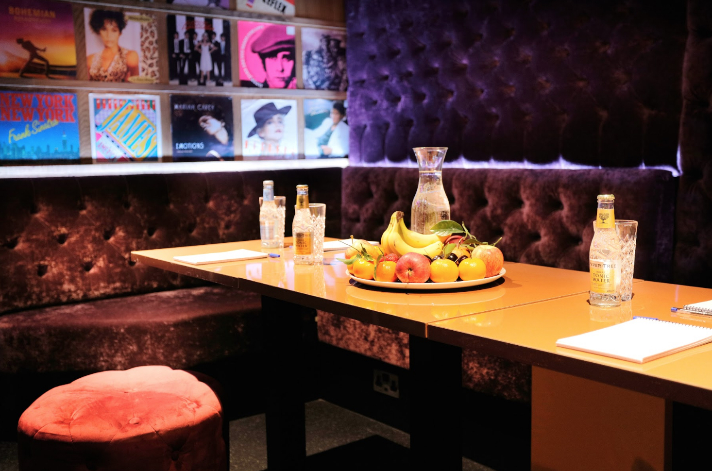 Stylish bar area with plush seating, ideal for meetings and gatherings at Lucky Voice Holborn.