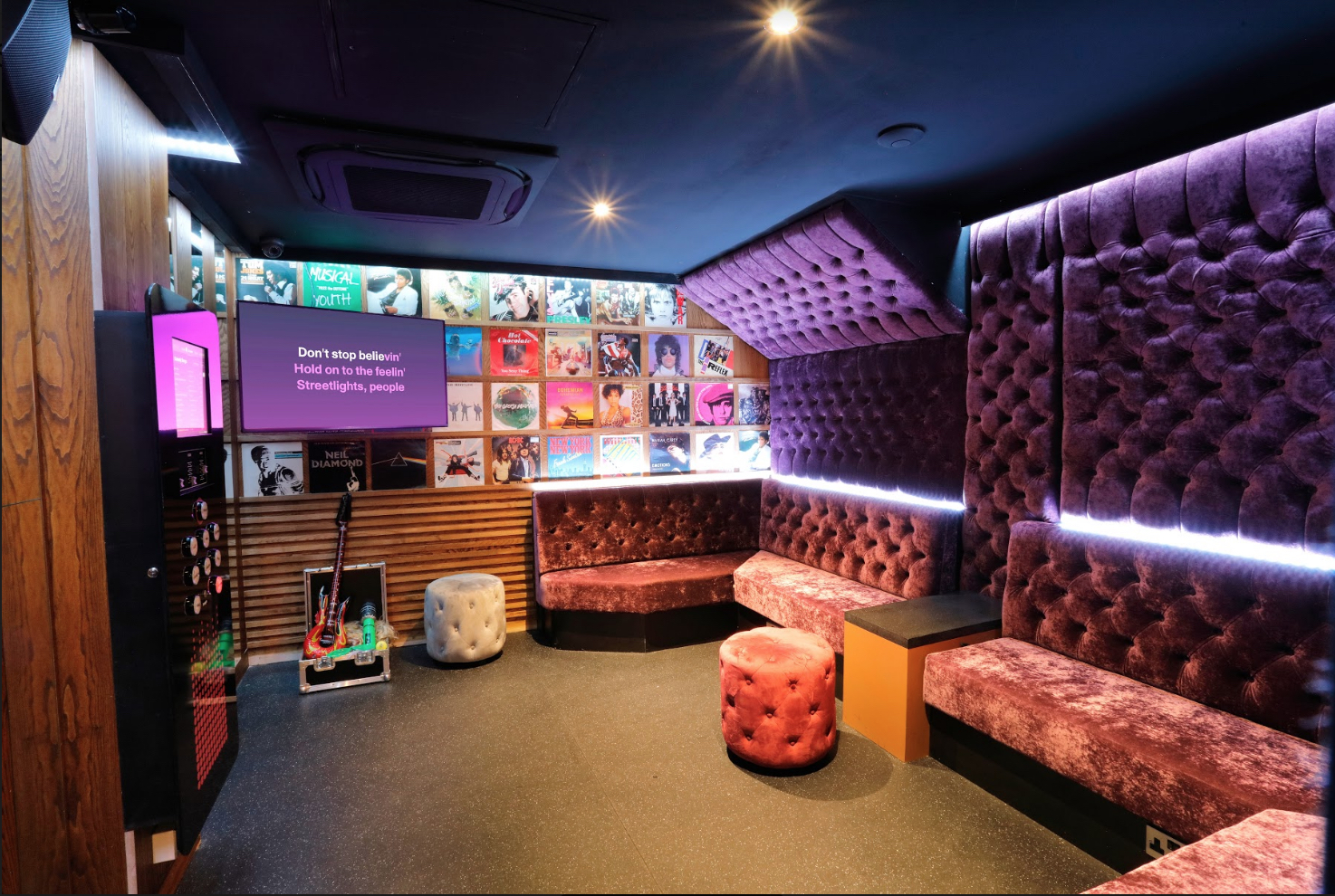 Private karaoke room at Lucky Voice Holborn, vibrant decor for events and gatherings.