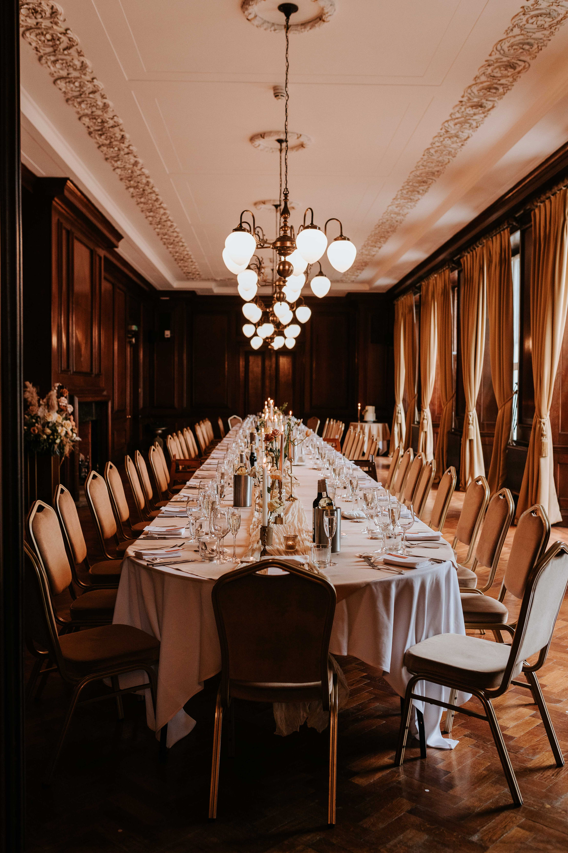 Elegant meeting space in Manchester Hall with ornate ceiling, ideal for events and conferences.