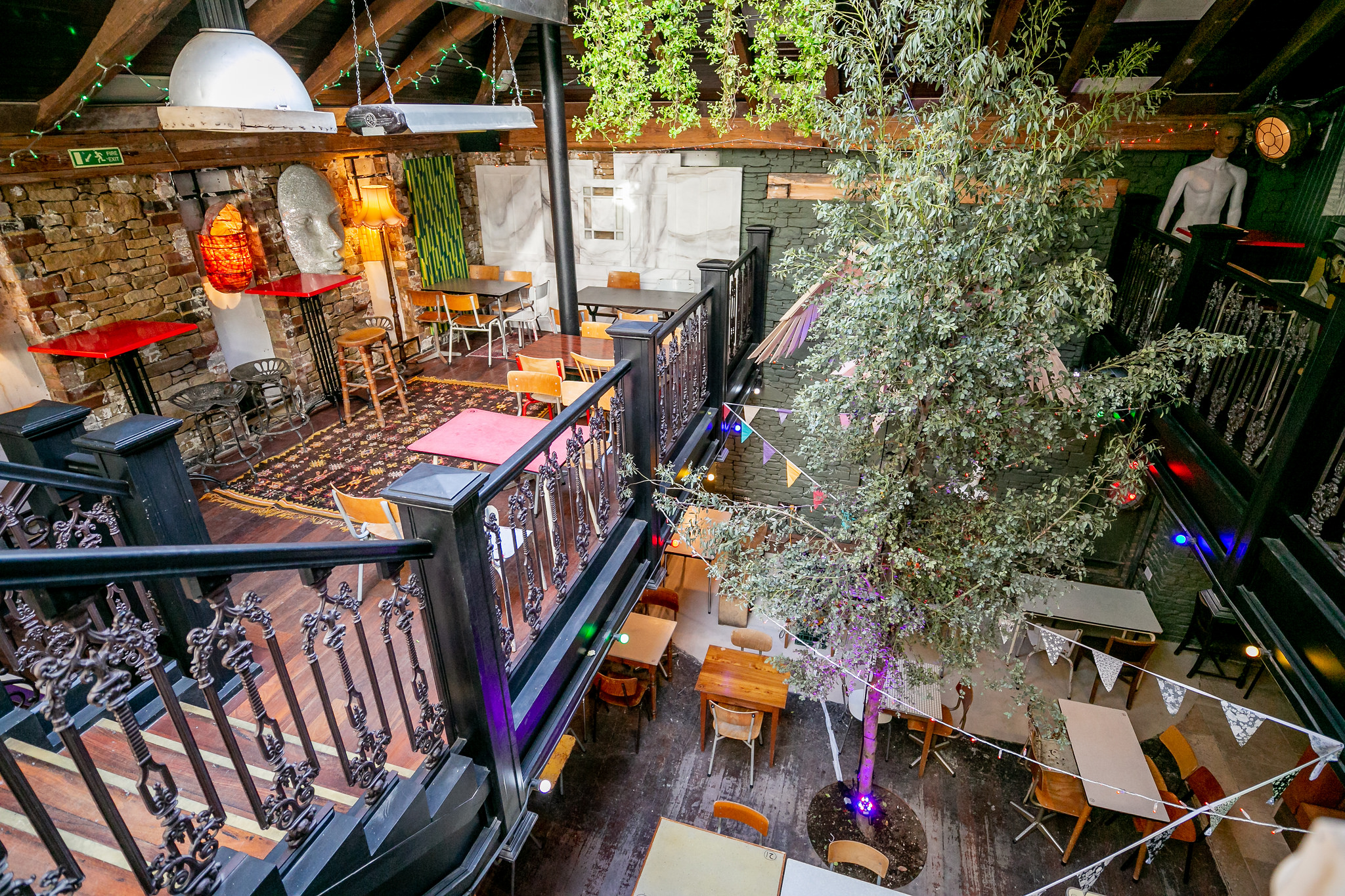 Vibrant Private Mezzanine event space with rustic charm and modern decor for gatherings.
