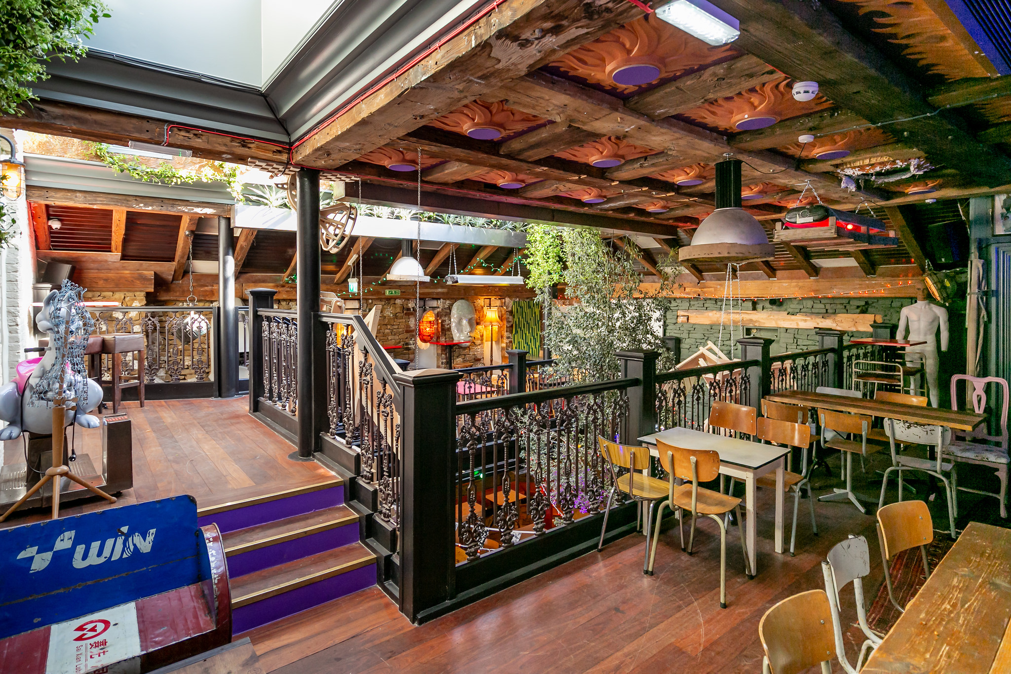 Private Mezzanine at Owl & Hitchhiker: rustic charm event space for gatherings and workshops.