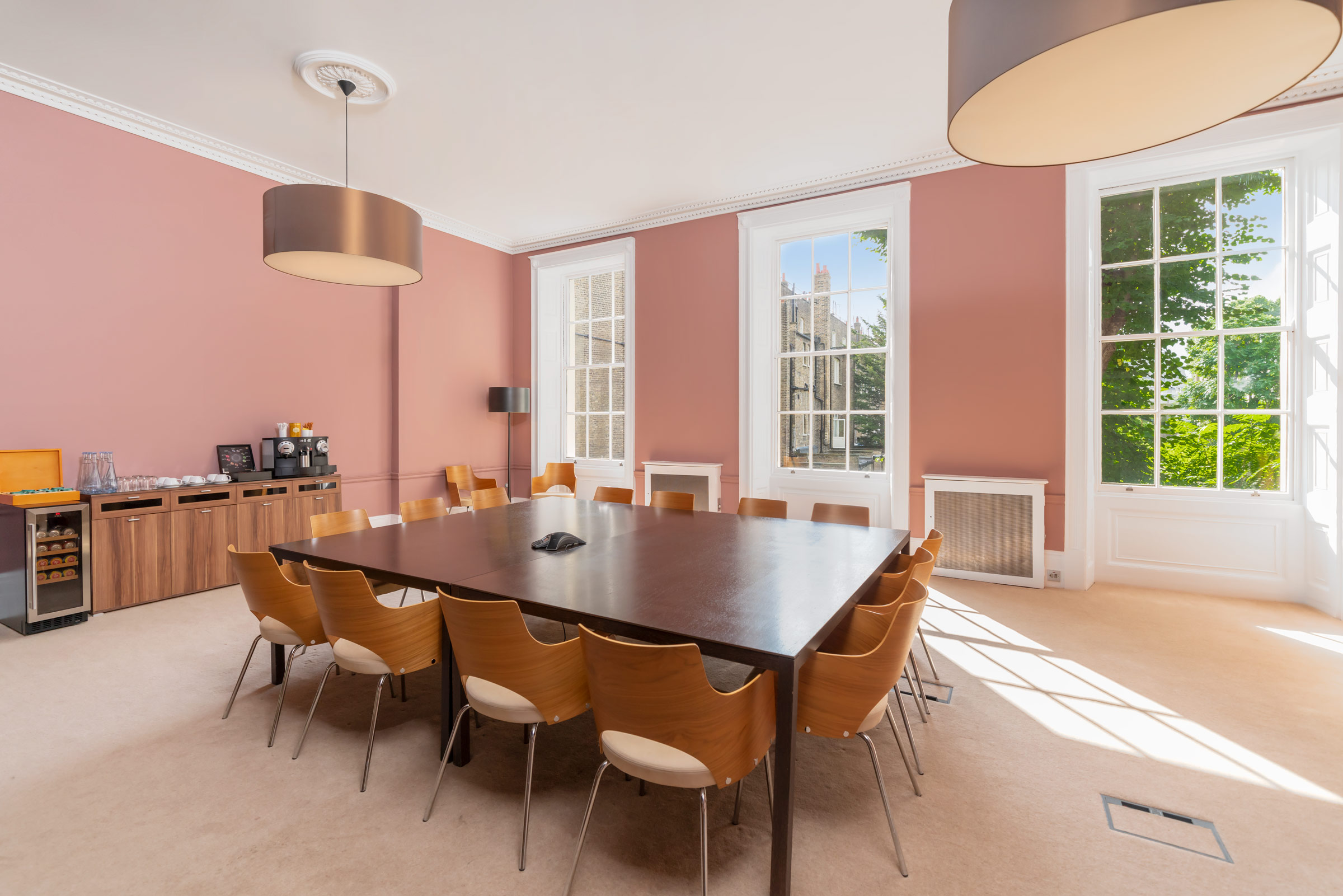 Russell Square Meeting Room with large table, ideal for meetings and brainstorming sessions.