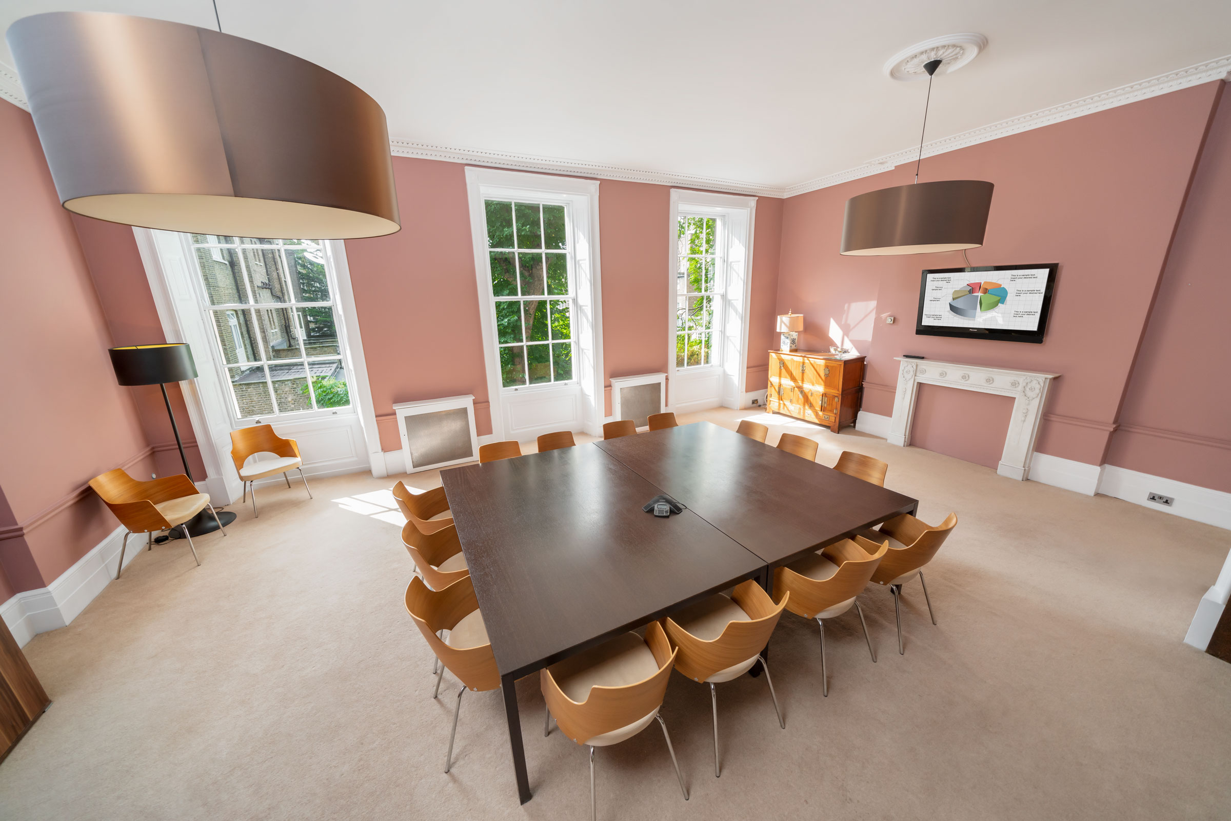 Private Gardens View Room with large table, ideal for meetings and presentations.