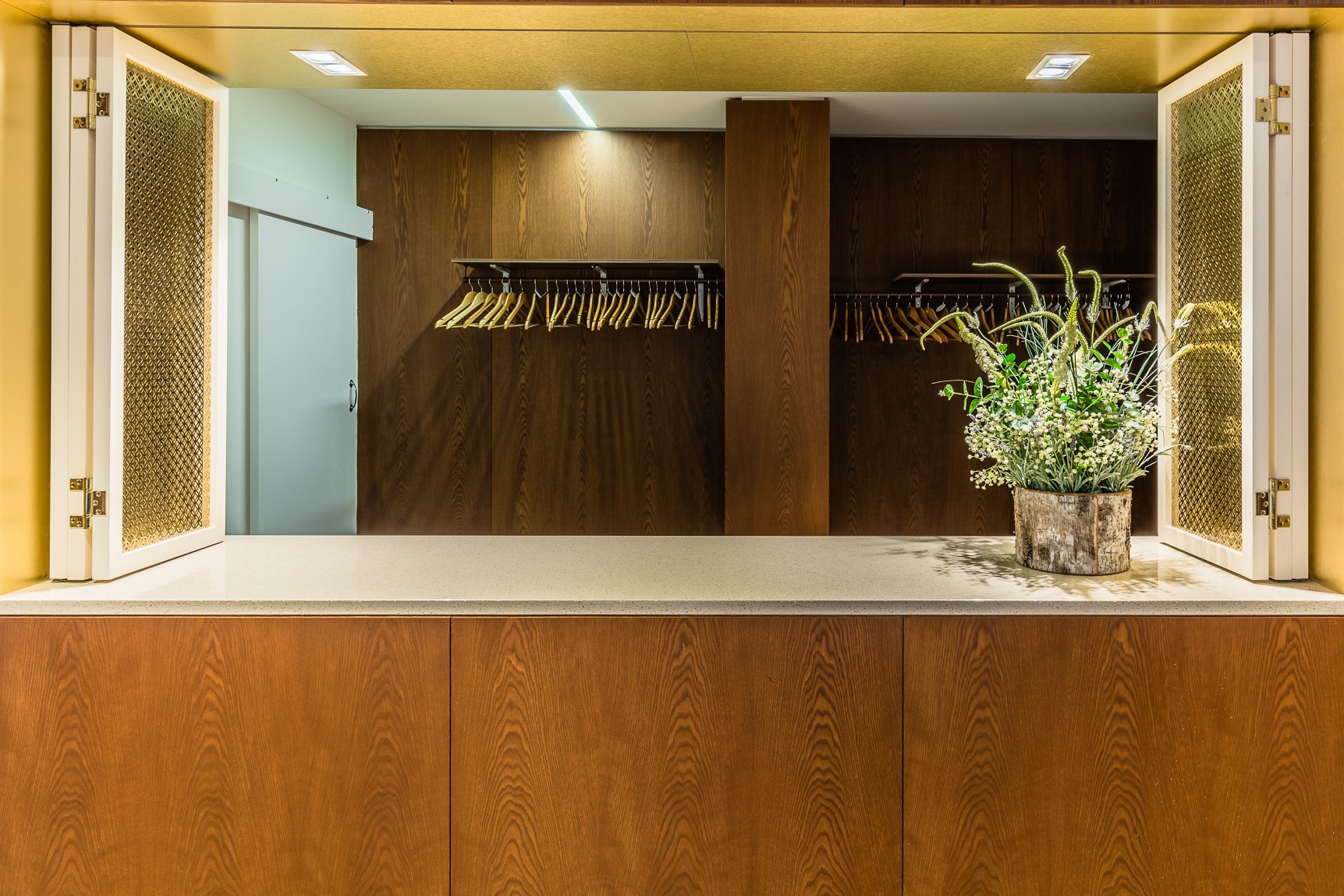 Modern reception area with warm wood tones for events at Farmers & Fletchers.