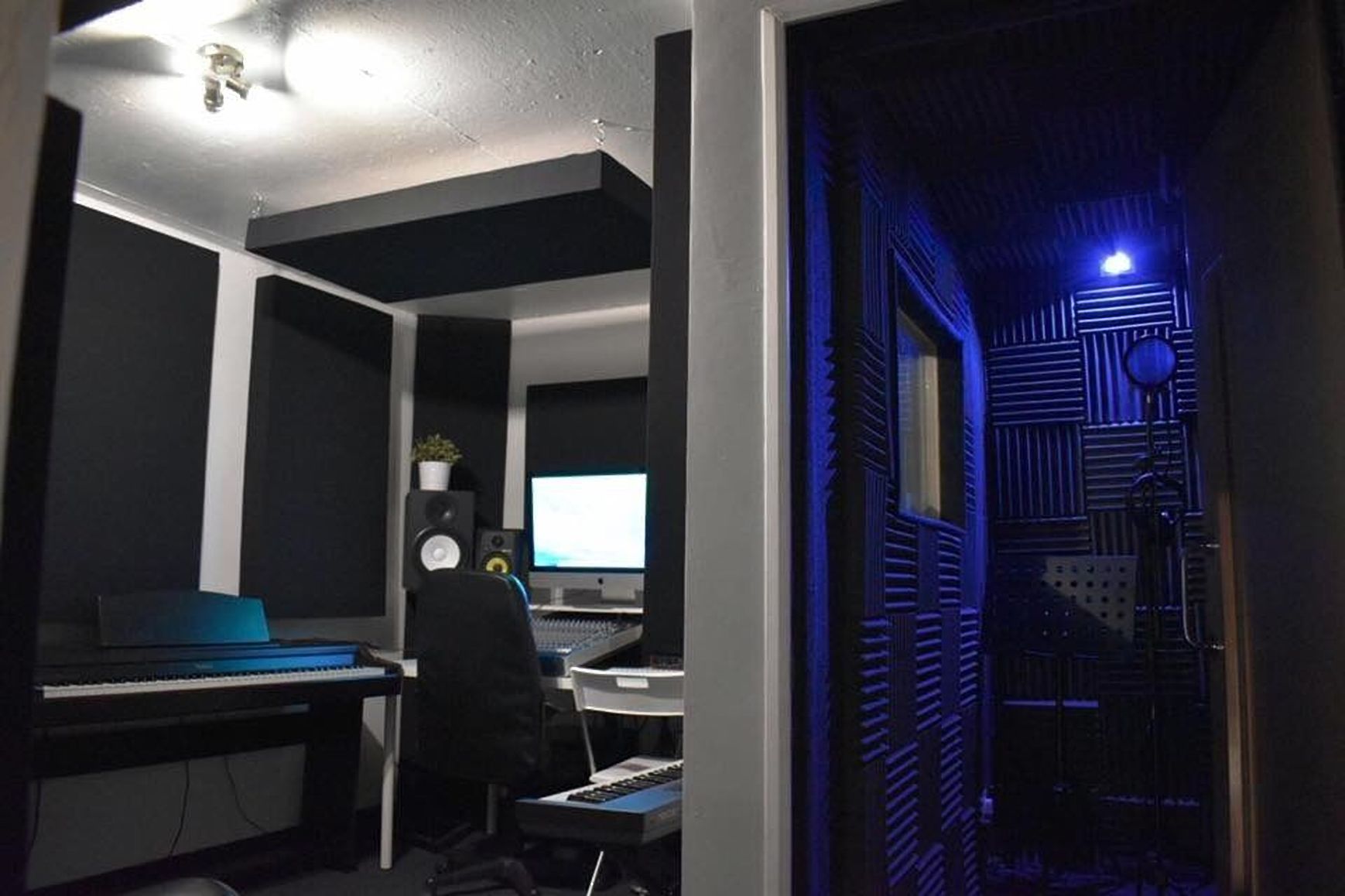 Modern Hackney Wick recording studio with ambient lighting for music workshops and events.