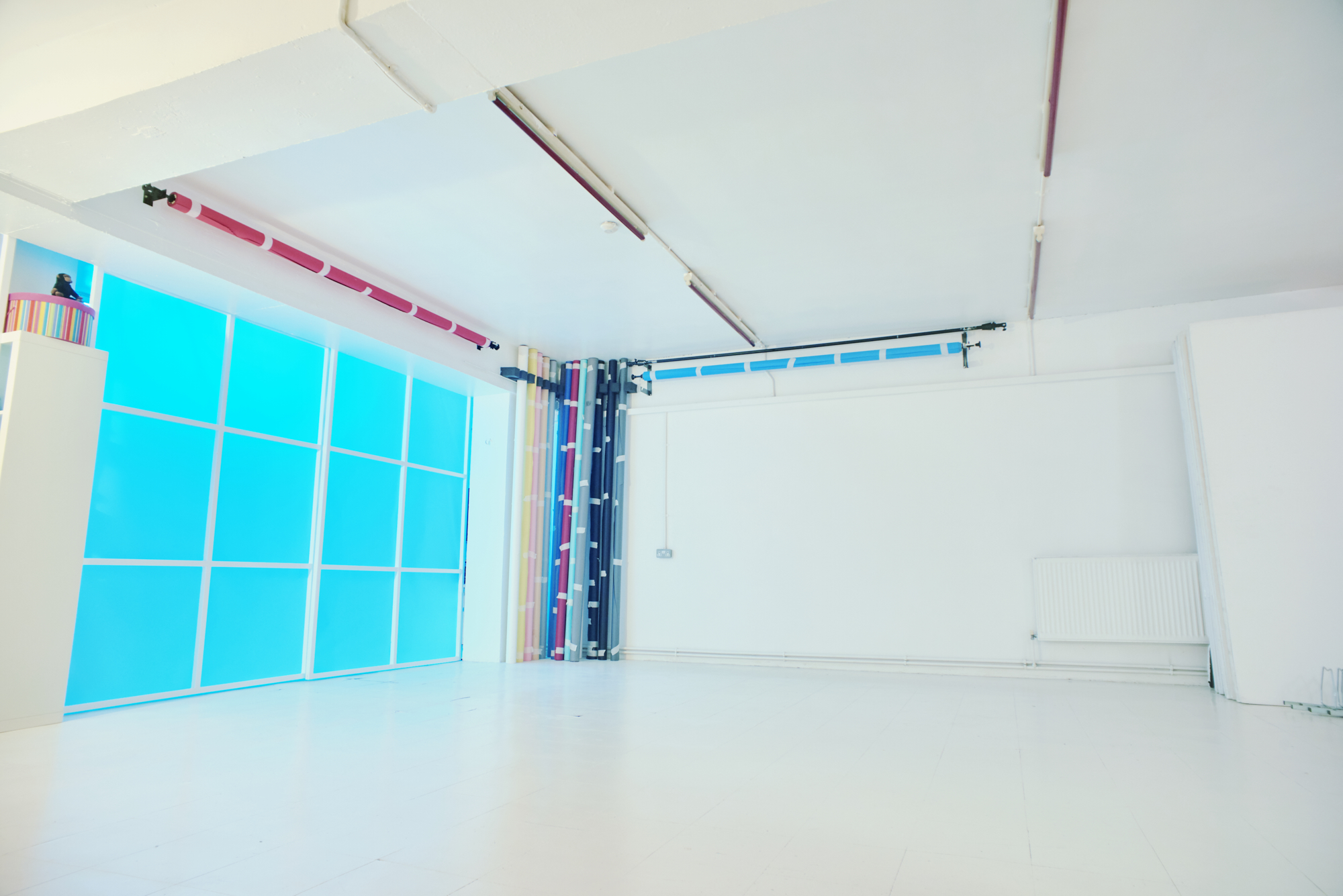 Versatile event space with large windows, perfect for workshops and networking events.