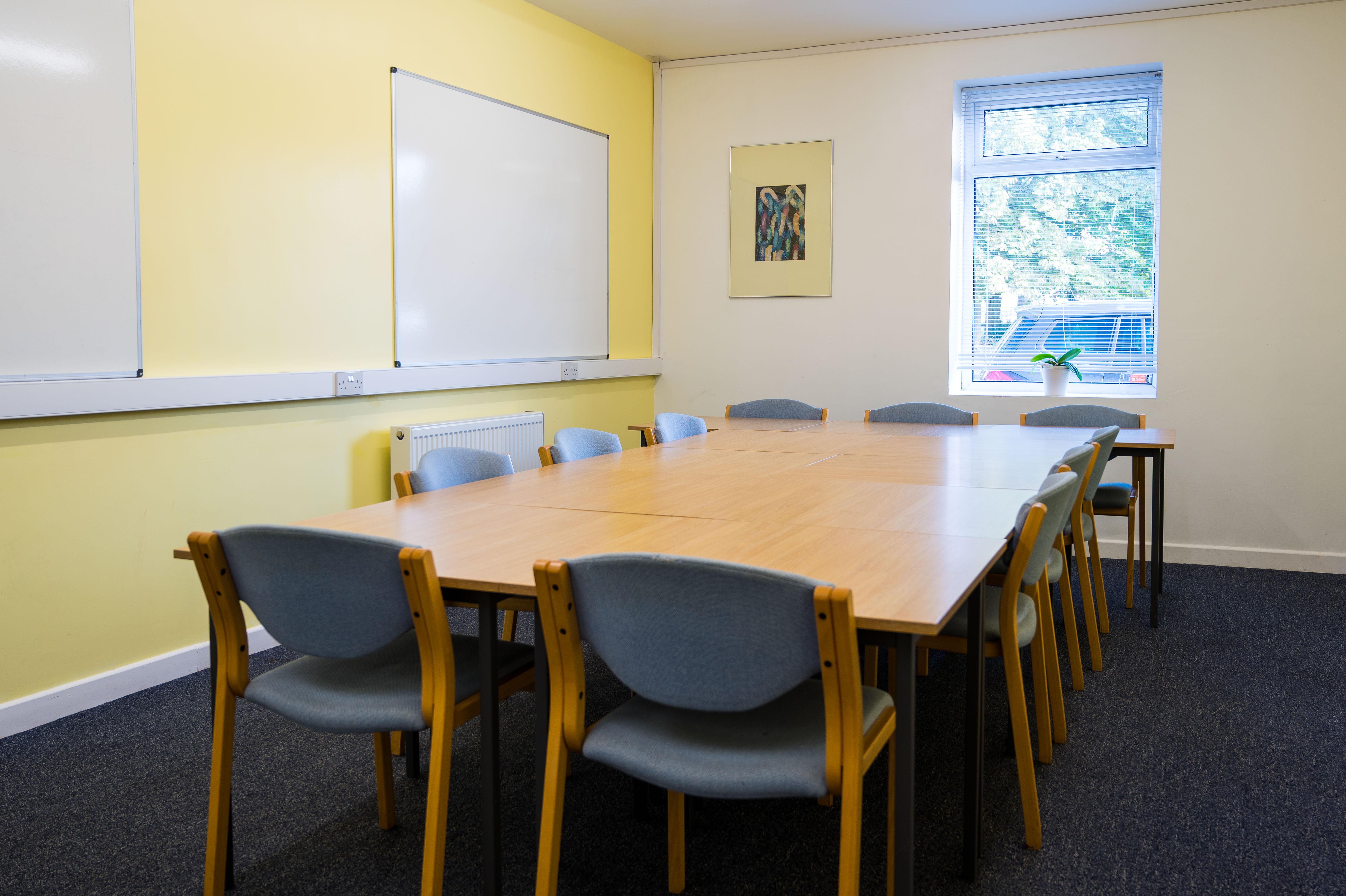 Training Room 1 at Wesley House, Salford: bright, collaborative space for workshops and meetings.
