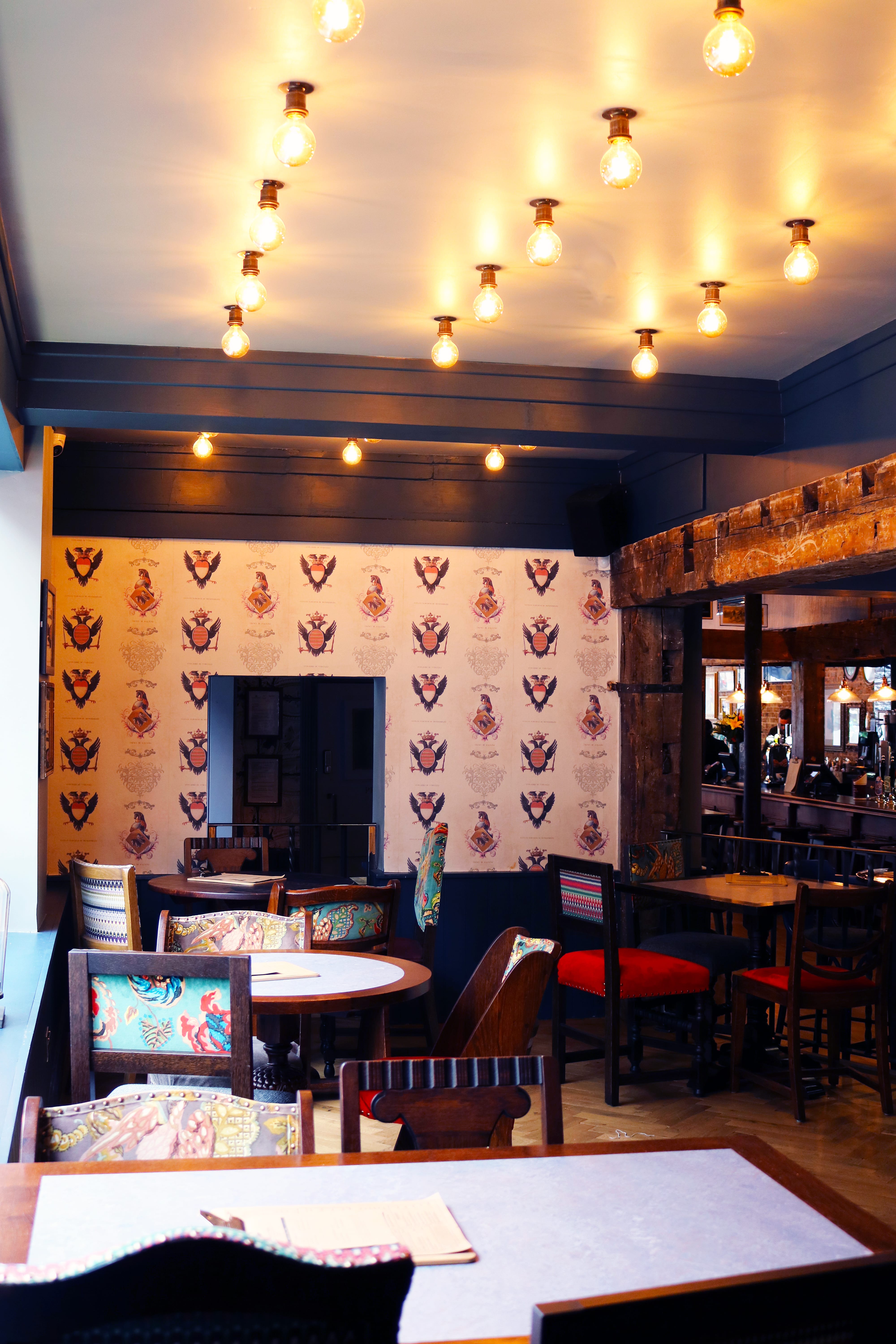 Stylish Millbank Corner venue with warm lighting, perfect for events and meetings.