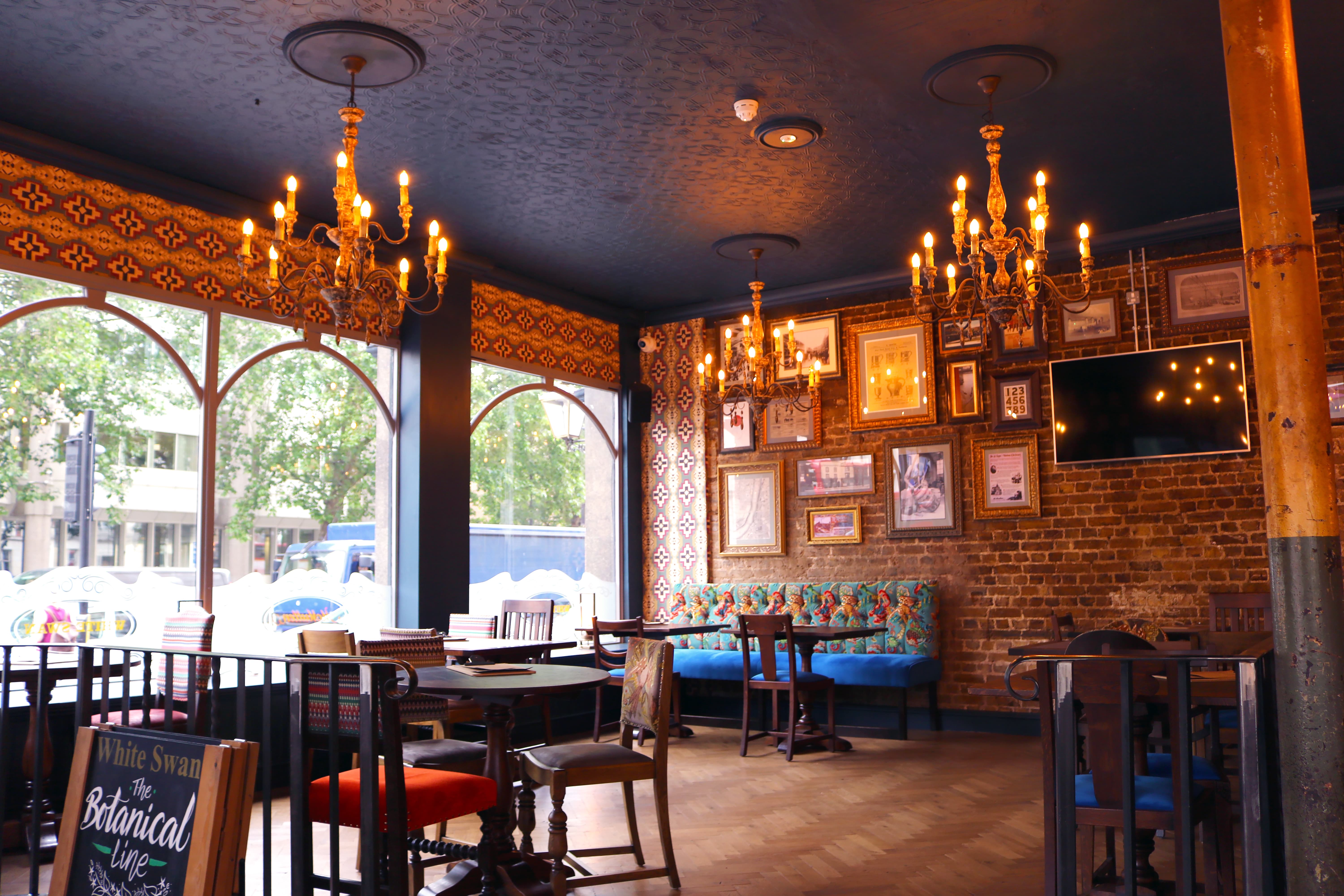 Stylish Pimlico Corner venue with elegant chandeliers for gatherings and networking events.