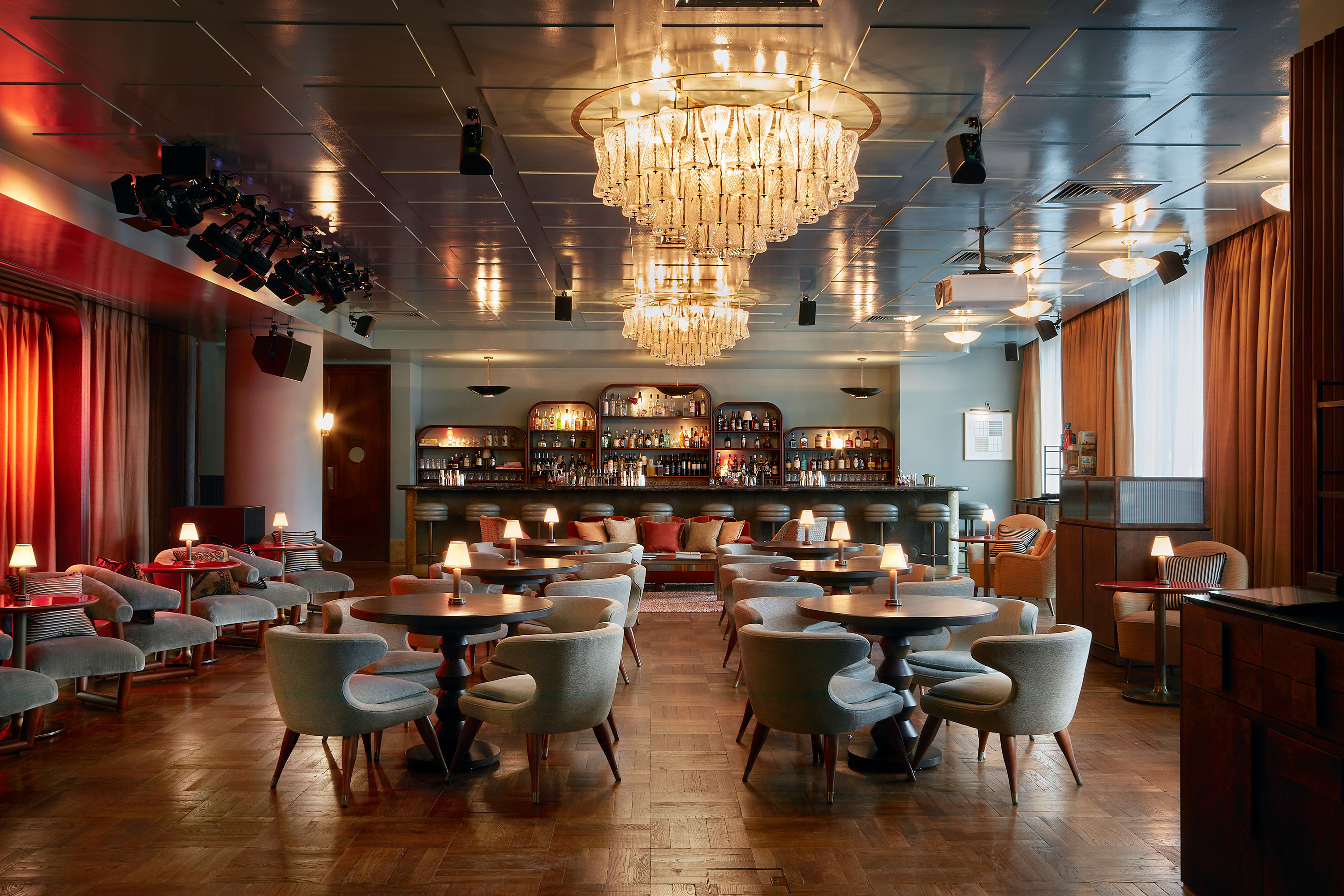 Elegant event space at White City Studio with stylish bar and inviting seating.