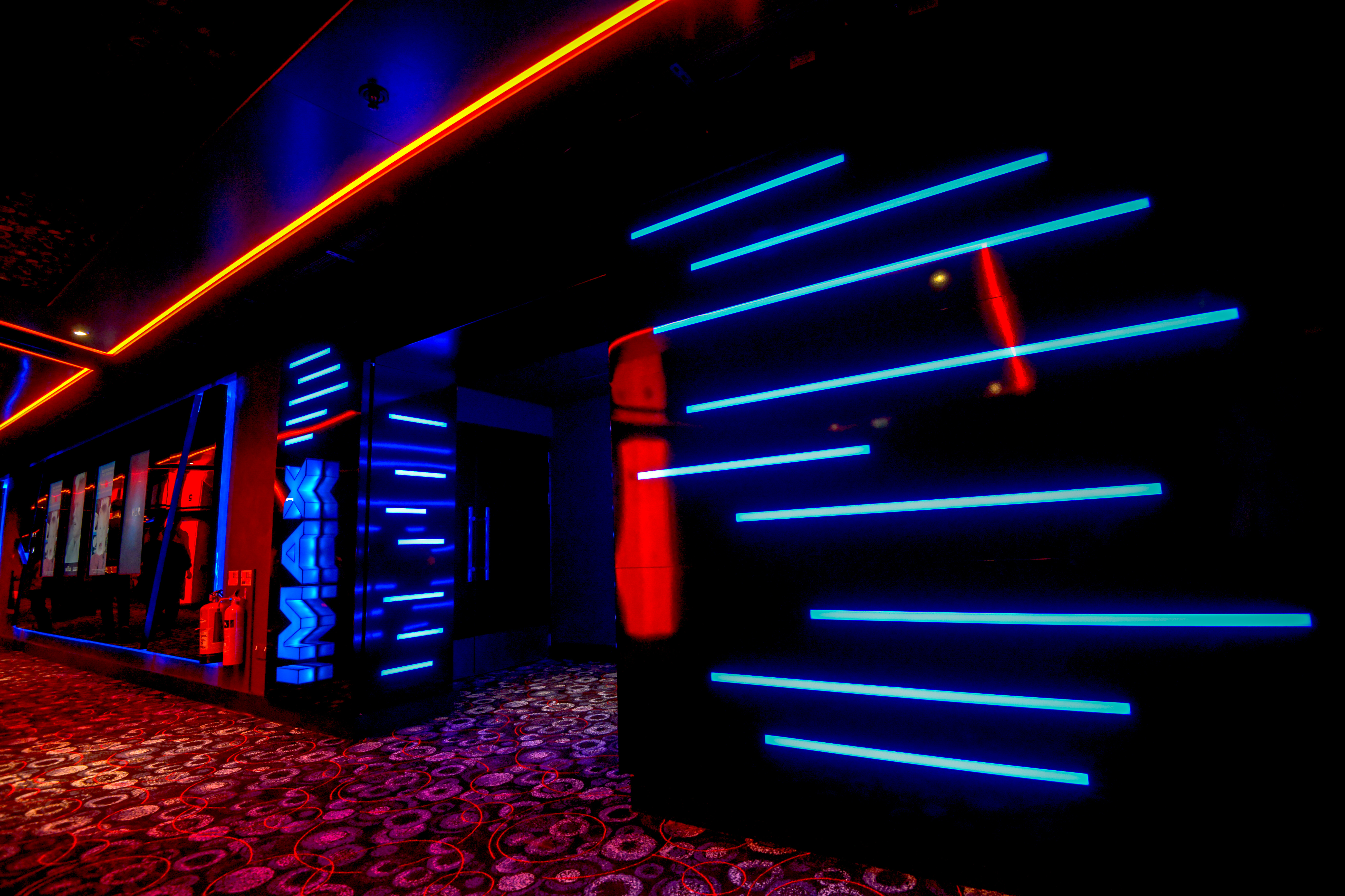 IMAX screen 1 at Cineworld Watford with vibrant blue and orange lighting for events.