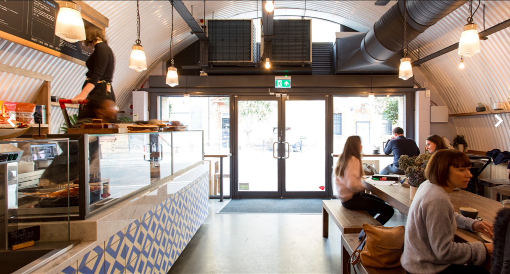 Modern café space in Arch Cafe, Herne Hill, perfect for networking and meetings.