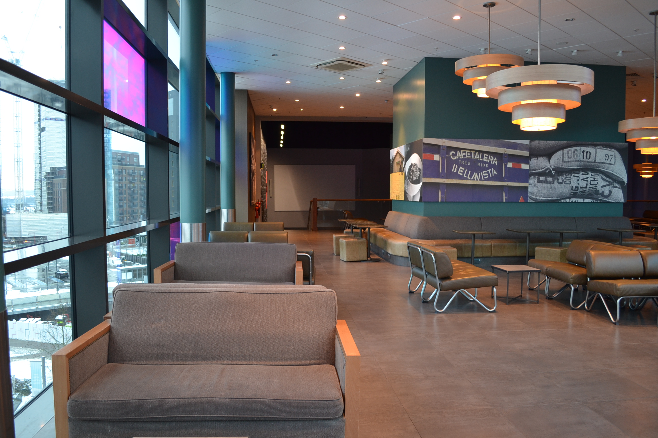 Modern lounge area in Cineworld Wembley for networking and meetings.