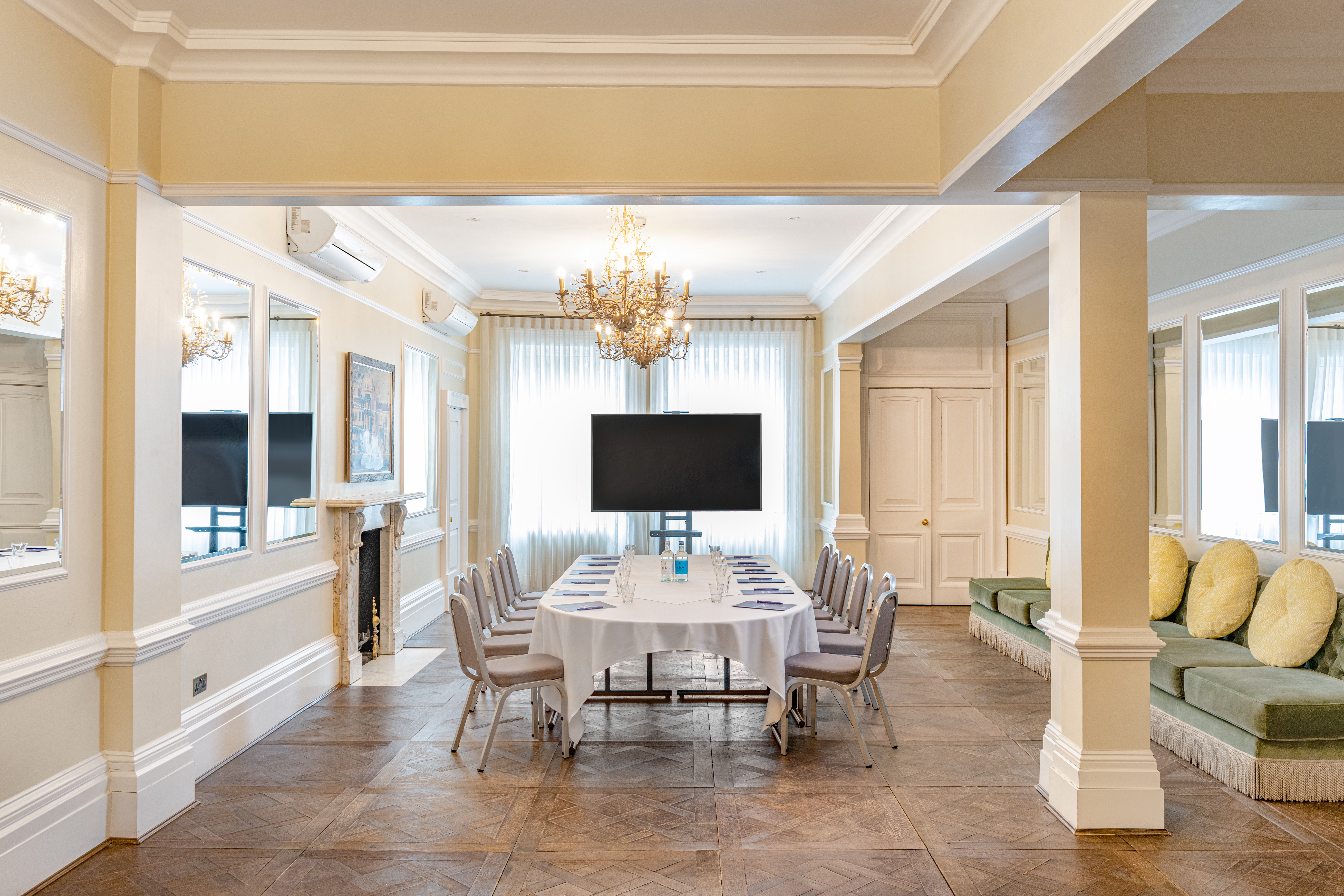 Richmond Room at Richmond Harbour Hotel, elegant meeting space with natural light.