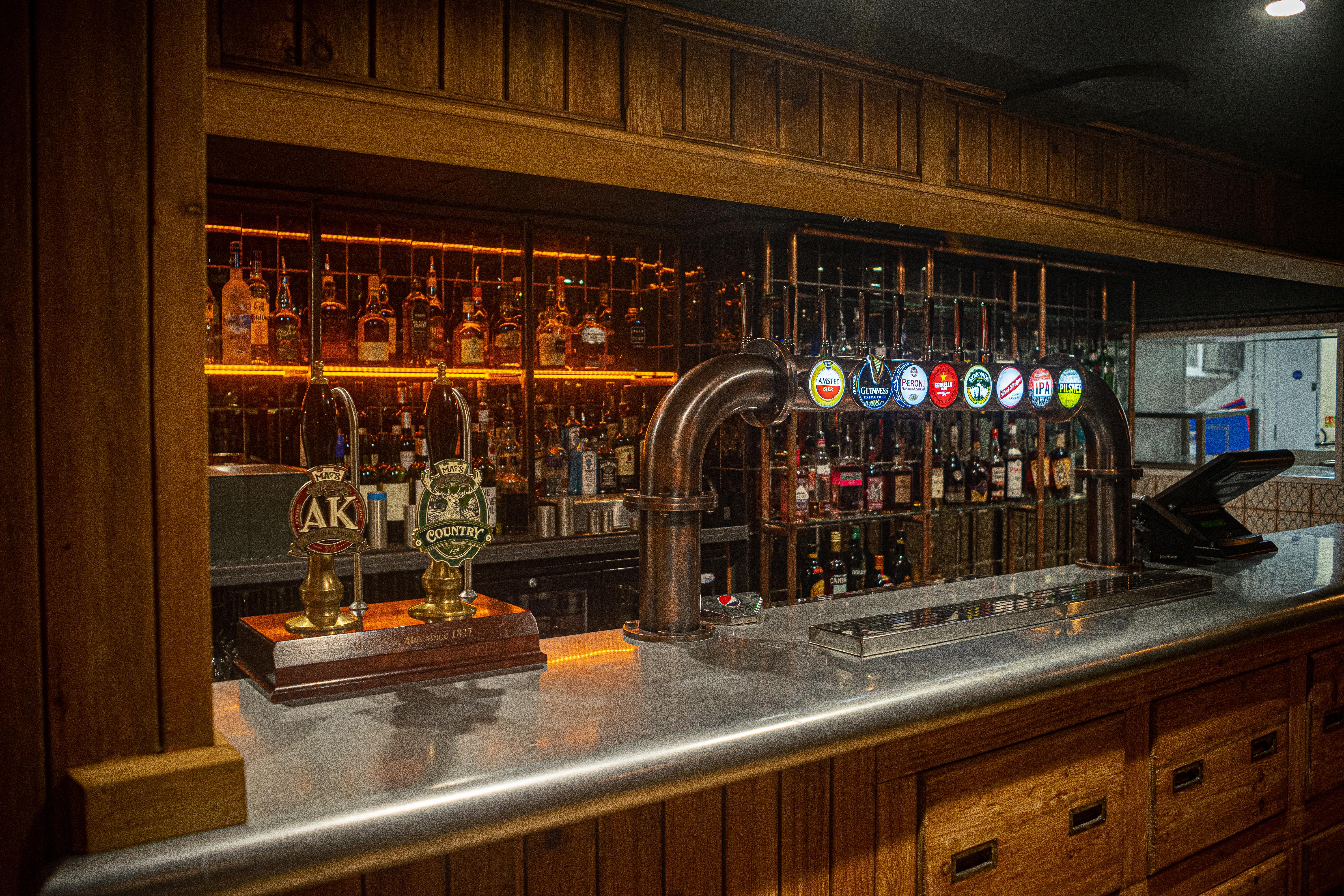 Backstage Basement bar with craft beers, perfect for networking events and receptions.