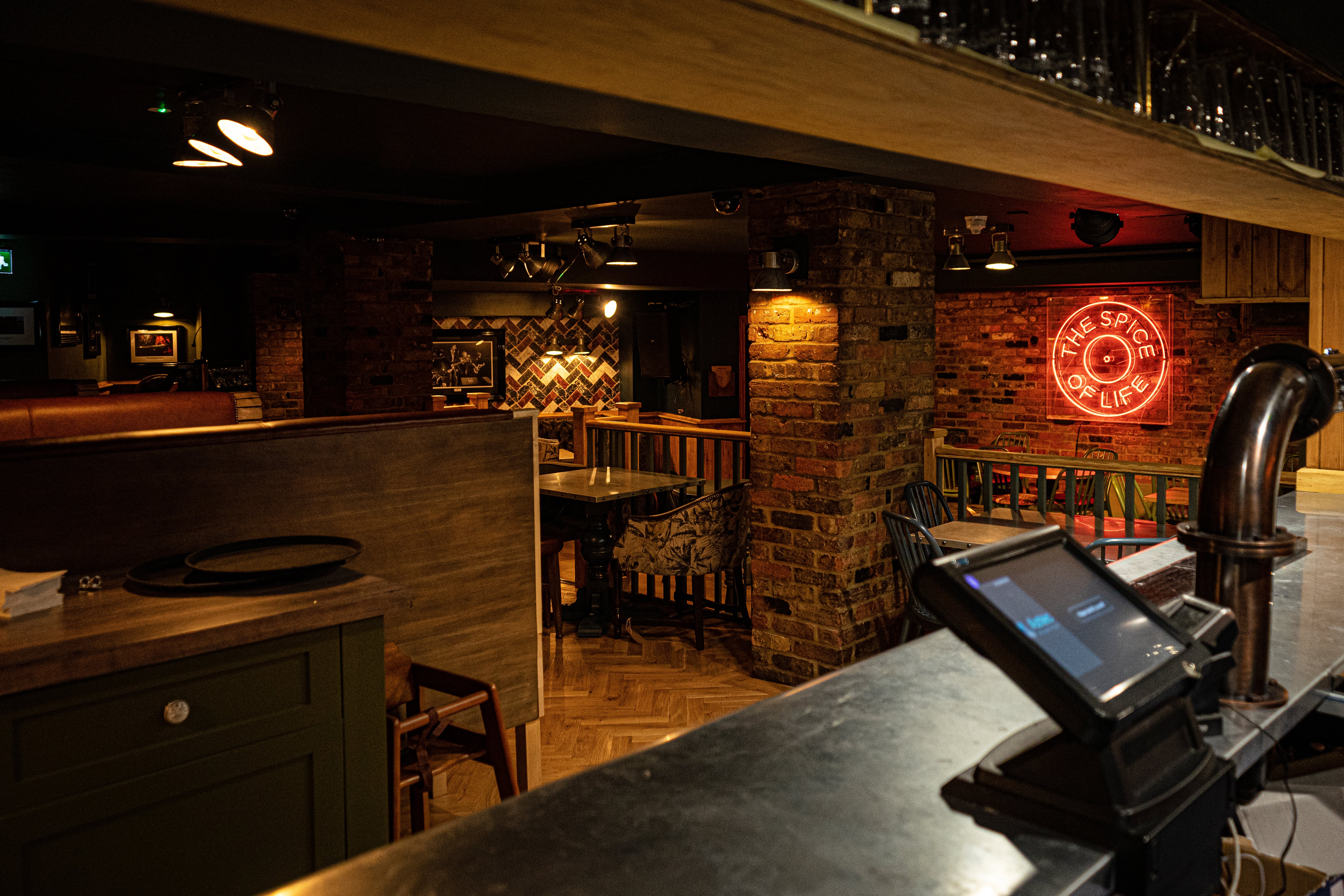 Backstage Basement at The Spice of Life: cozy venue with exposed brick for events.
