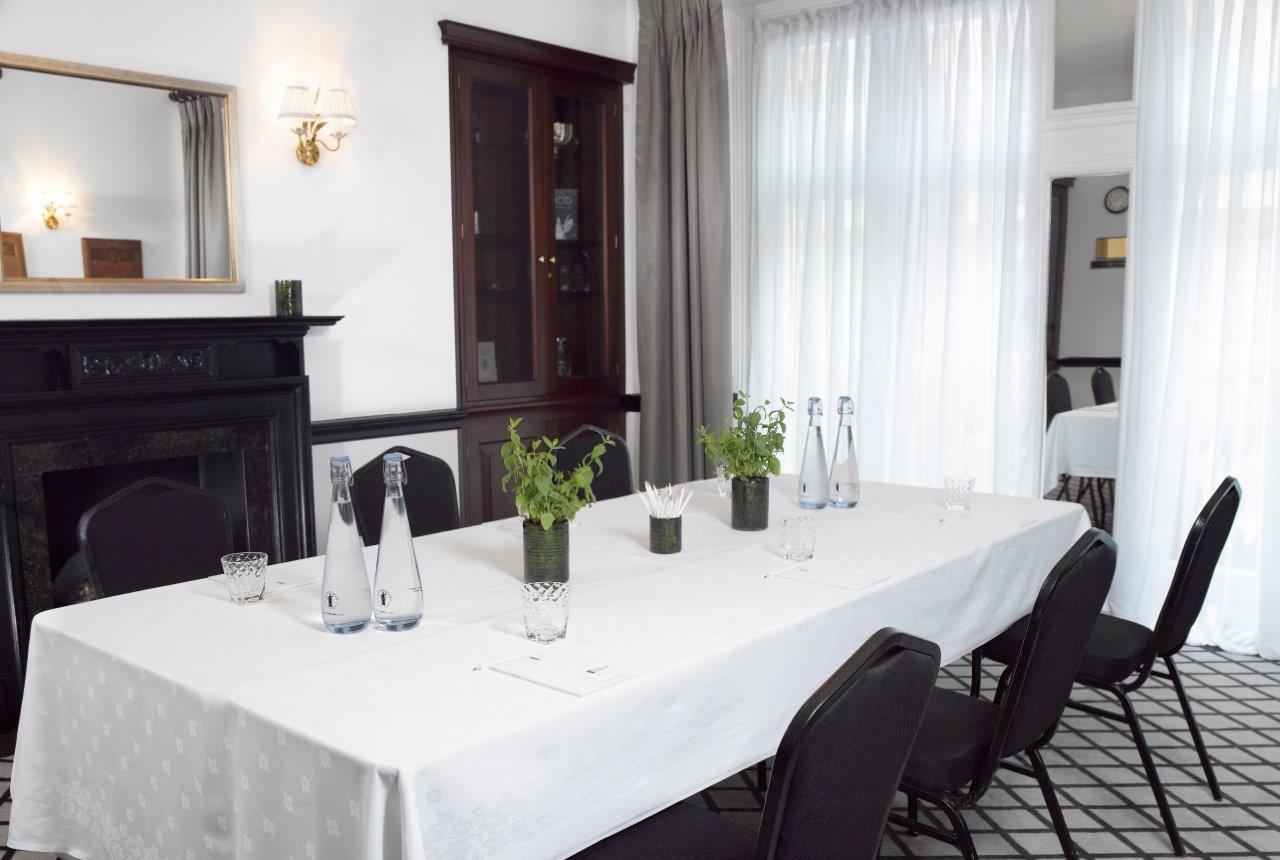 The Club Room at The Farmers Club, featuring a long table for meetings and gatherings.