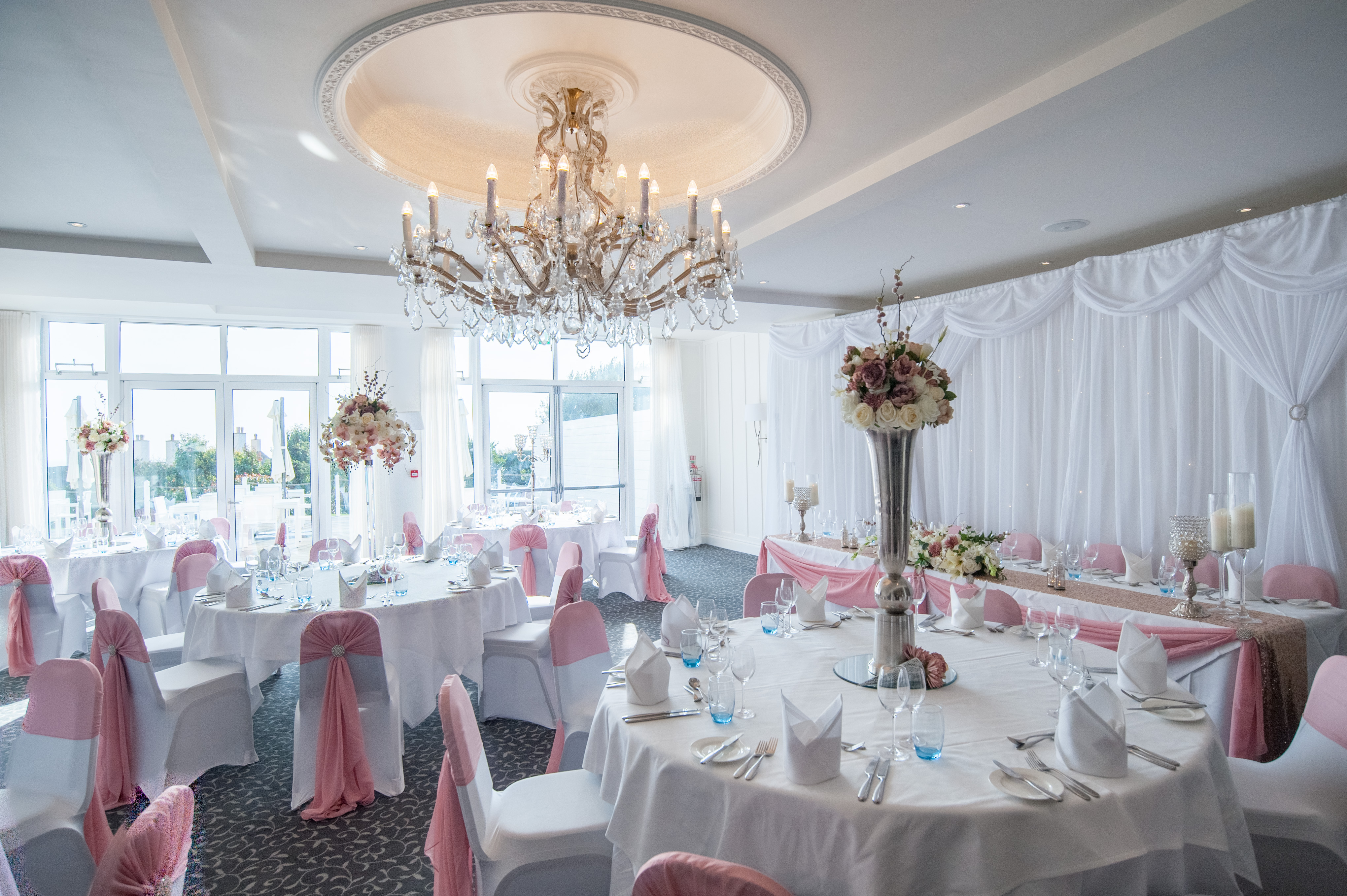 Elegant Connaught Suite at Sidmouth Harbour Hotel, ideal for weddings and formal events.