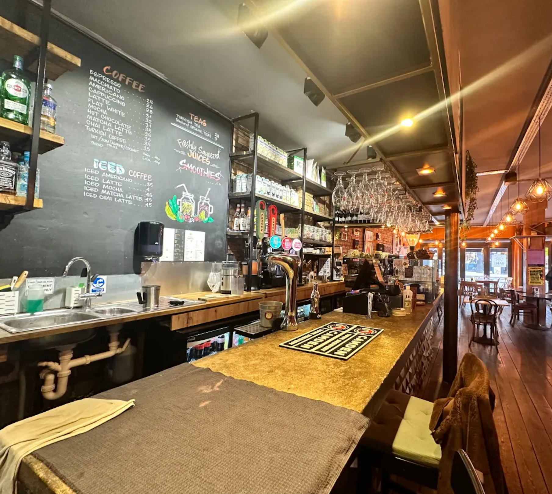 Cozy café bar at Babel Art House, perfect for networking events and informal meetings.