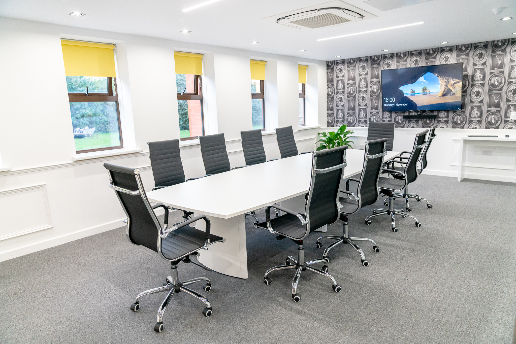 Modern conference room in Foundry House, Widnes with spacious table and ergonomic chairs.