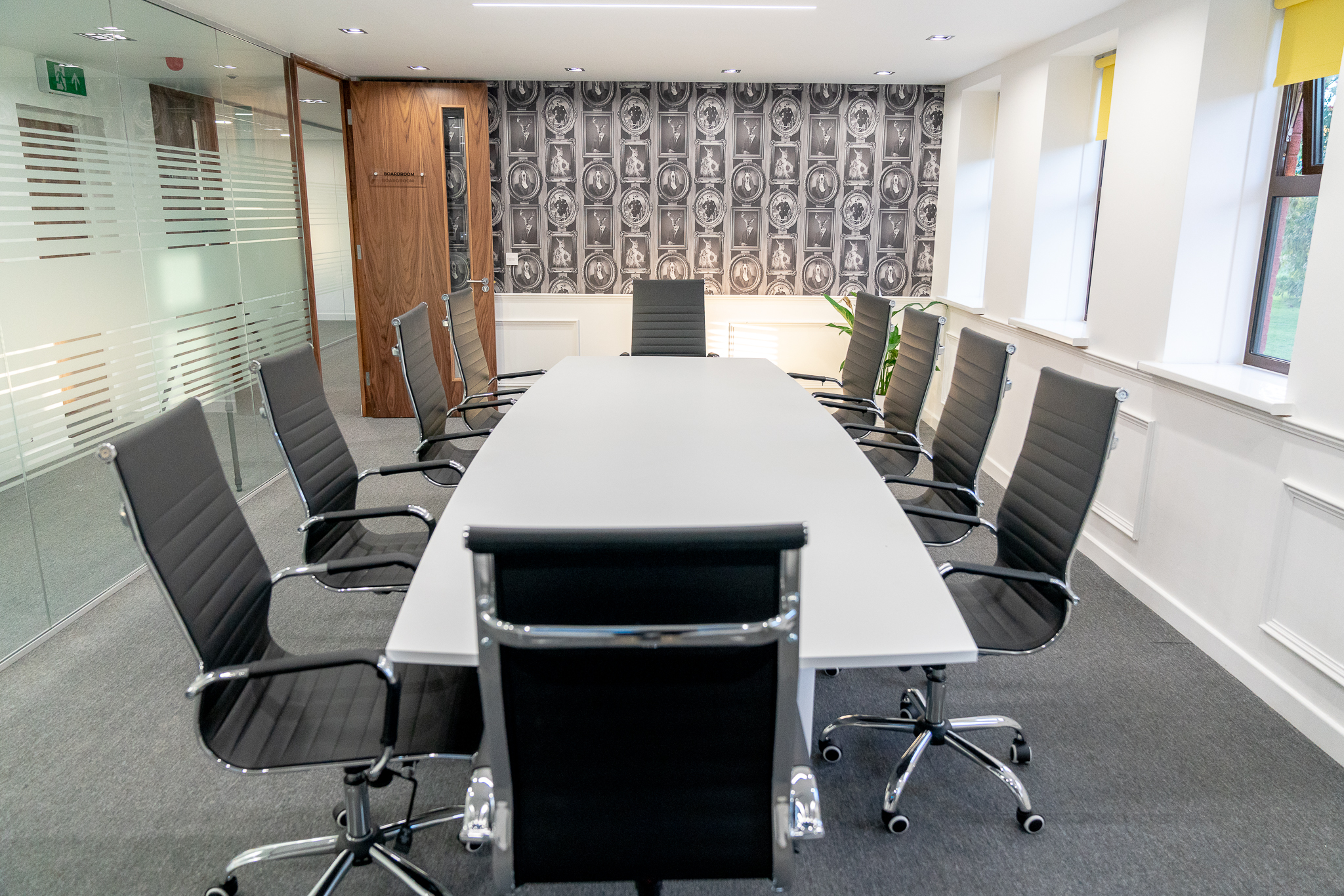 Modern conference room in Foundry House, Widnes with sleek table for corporate meetings.