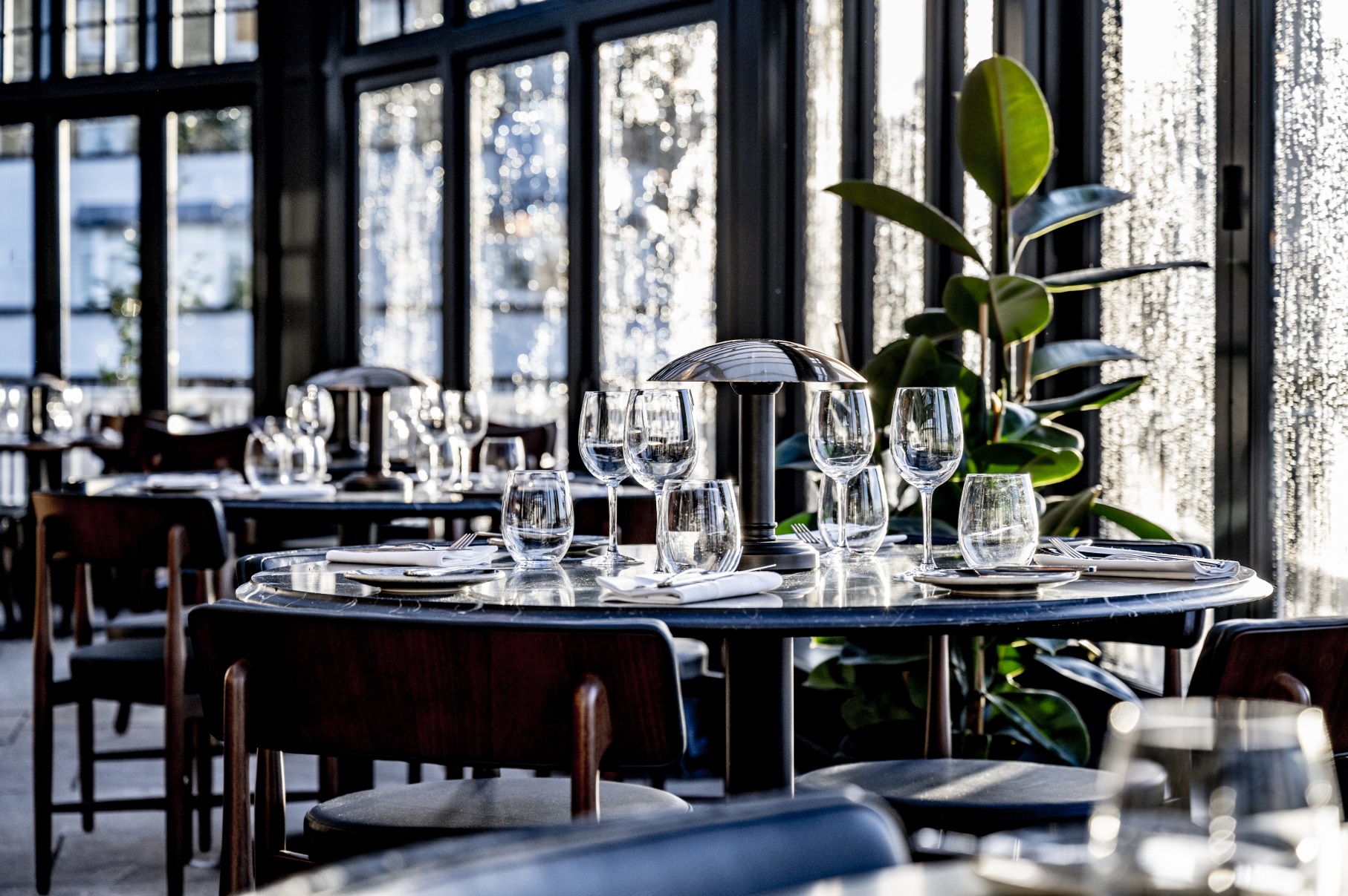 Elegant dining area at Bread Street Kitchen, perfect for upscale events and corporate meetings.