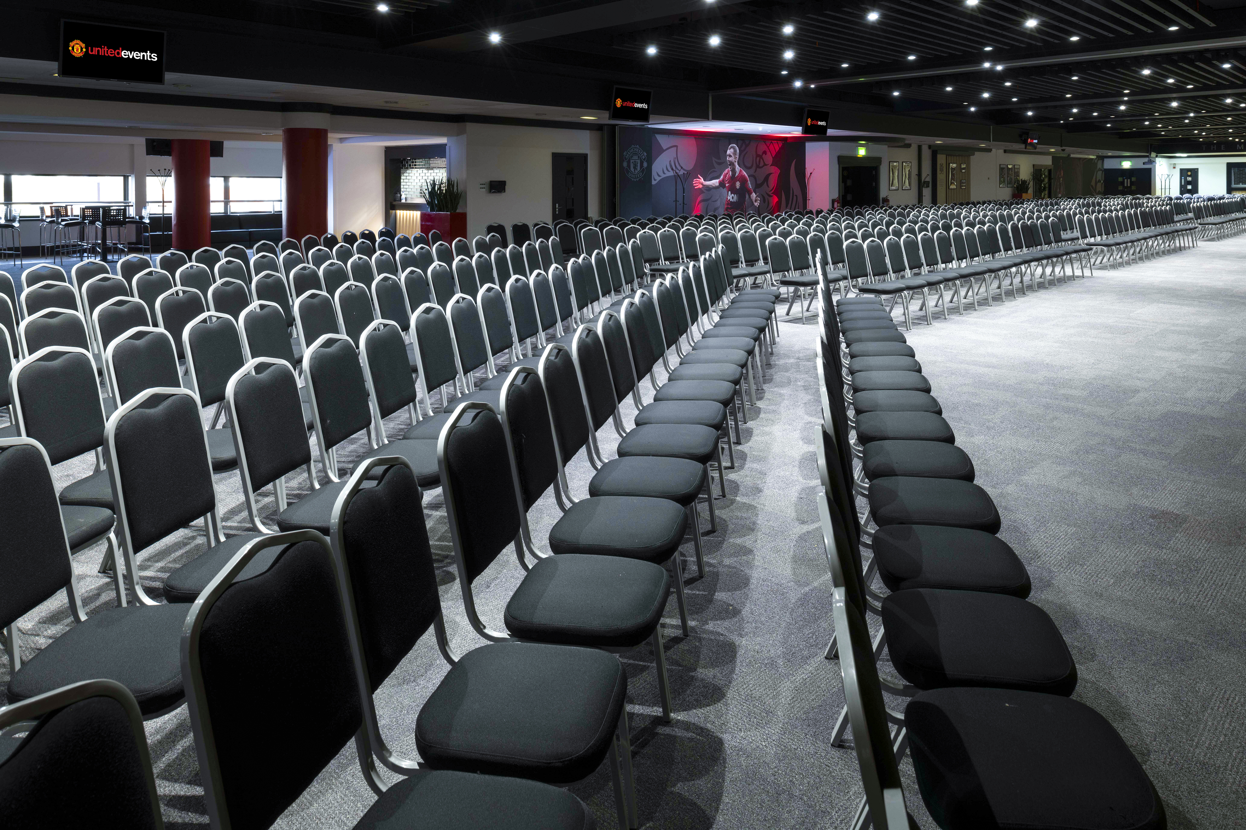 Conference event space at Old Trafford with organized seating for seminars and gatherings.