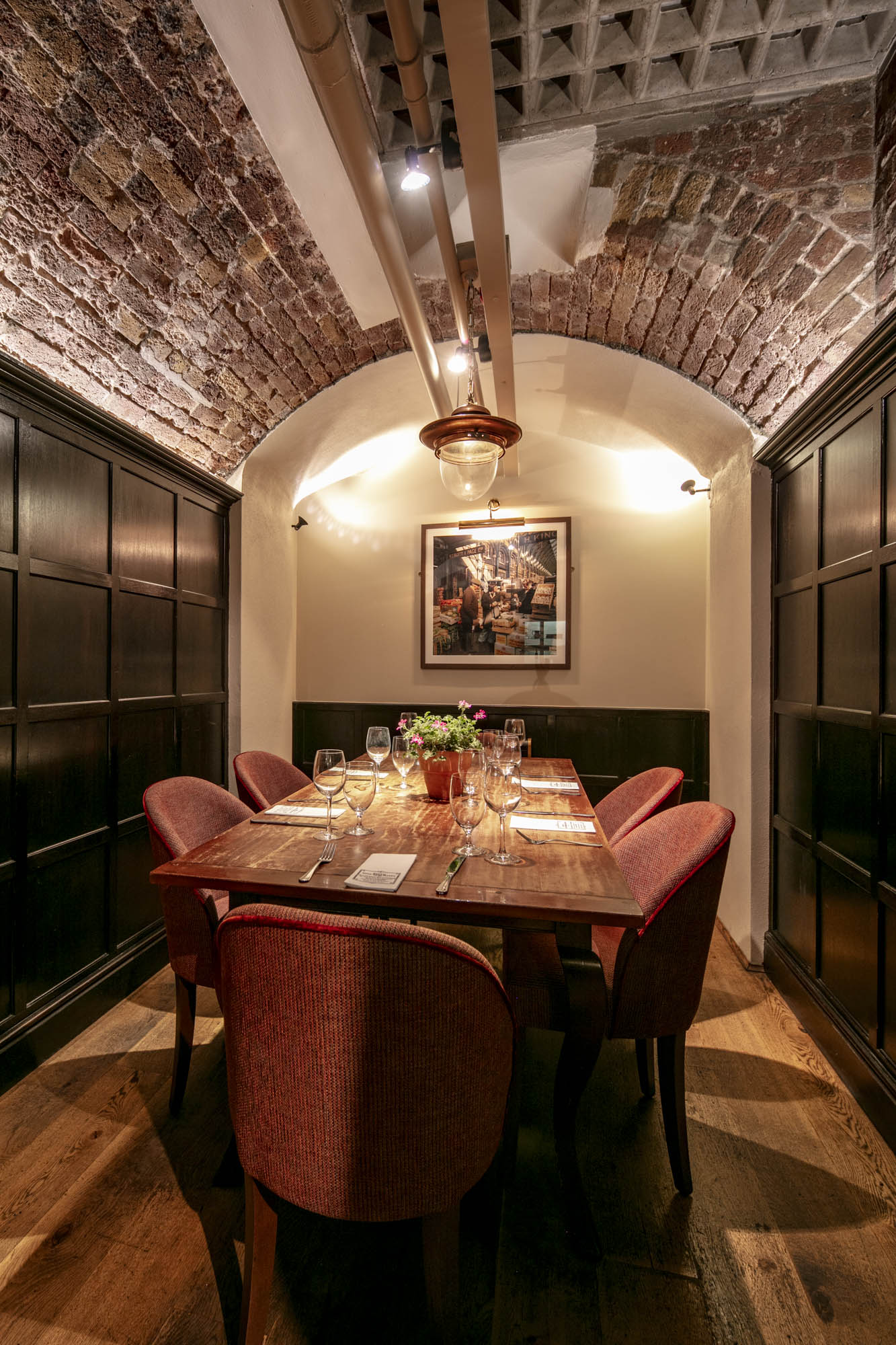 Intimate Board Room at Crusting Pipe, Covent Garden for upscale private events and meetings.