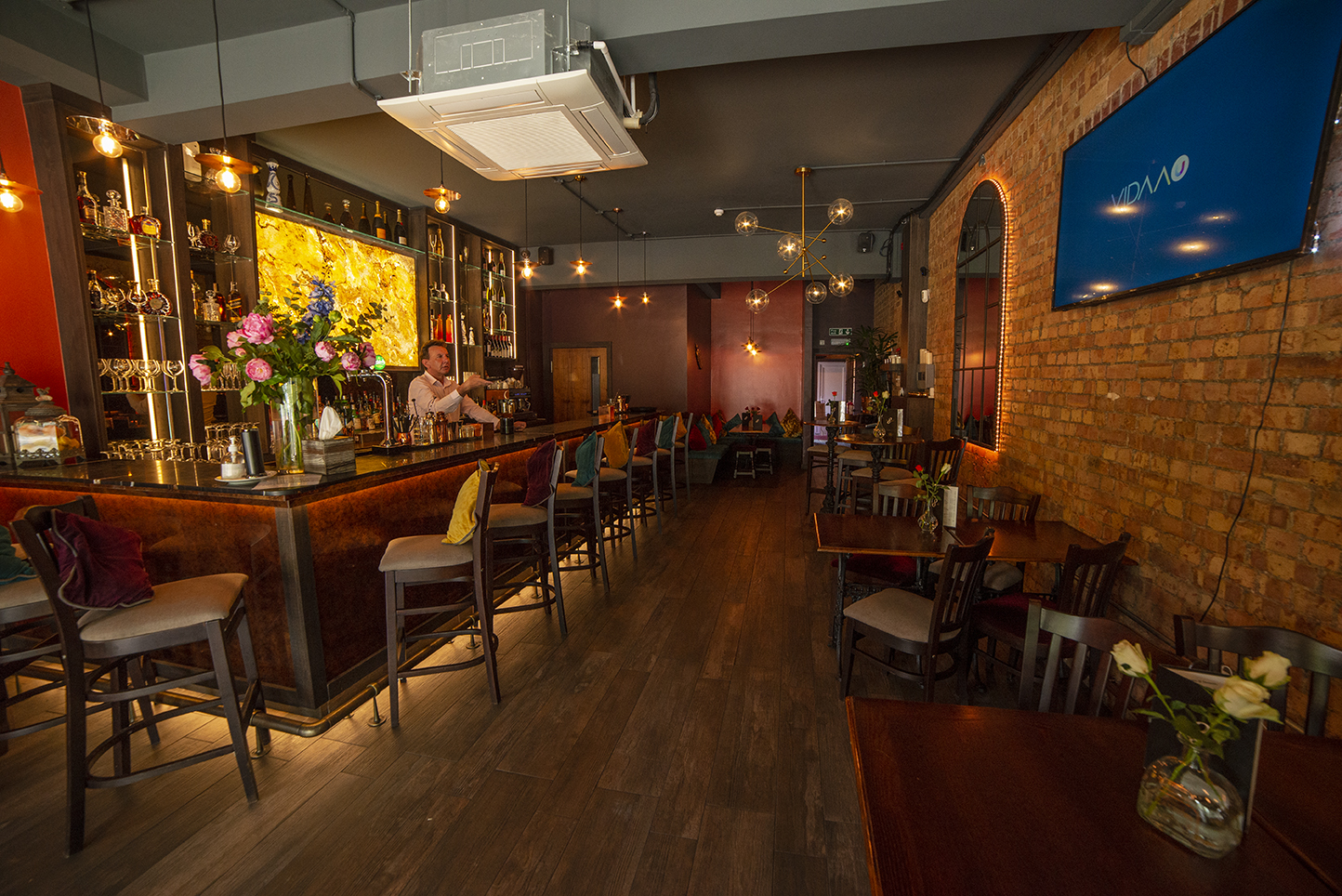 Stylish BAR 8 venue with warm ambiance, ideal for networking events and private parties.