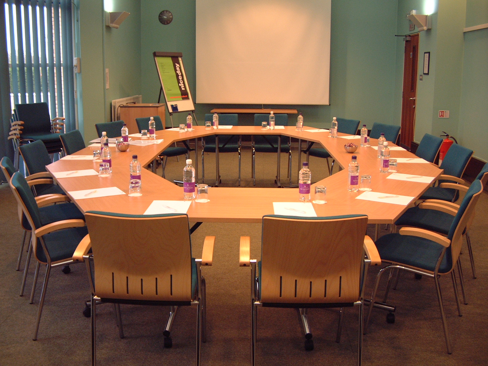 Roundtable meeting room in Fielder Centre, featuring organized seating and professional ambiance.