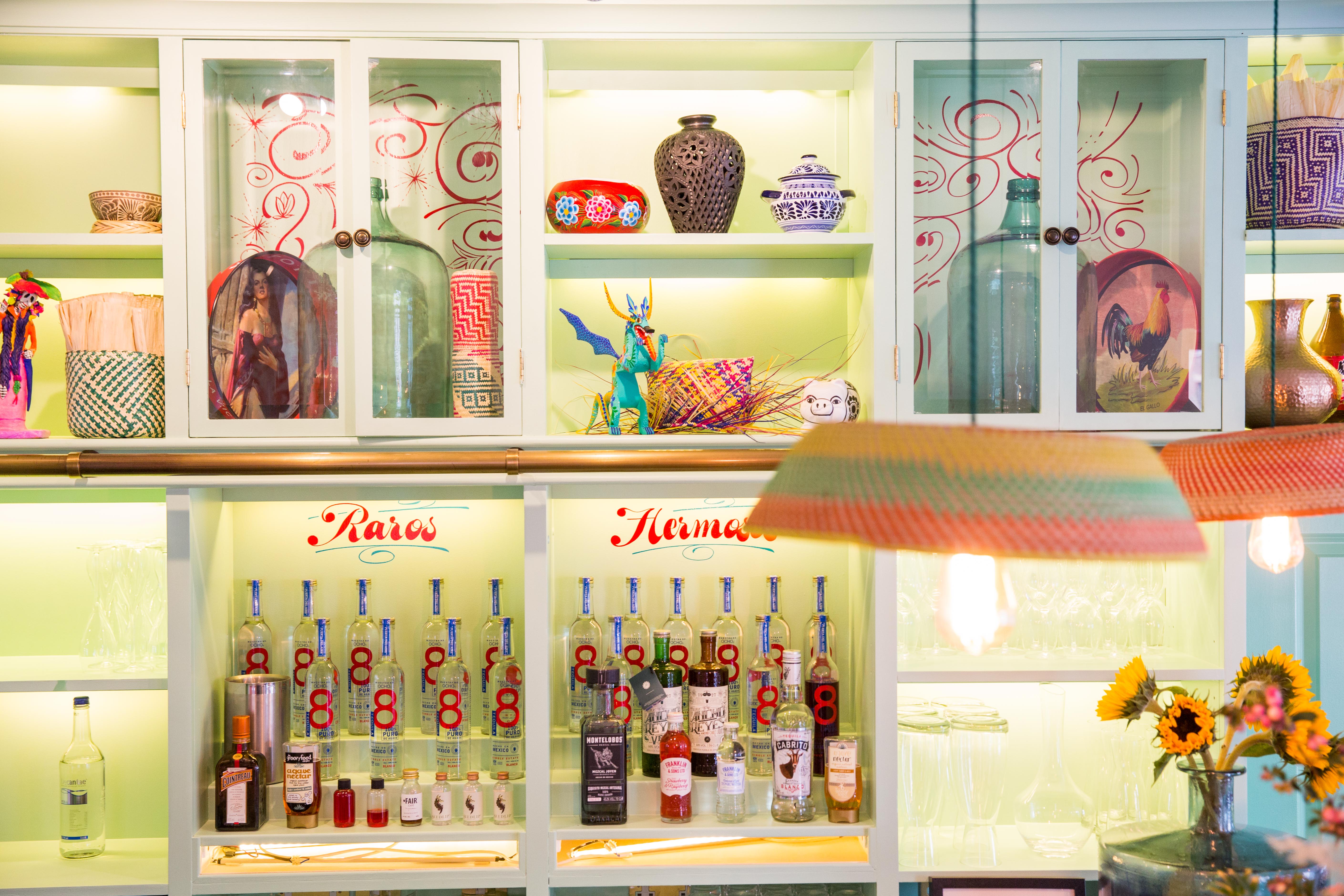 Agave dining room bar with colorful decor, ideal for social gatherings and events.