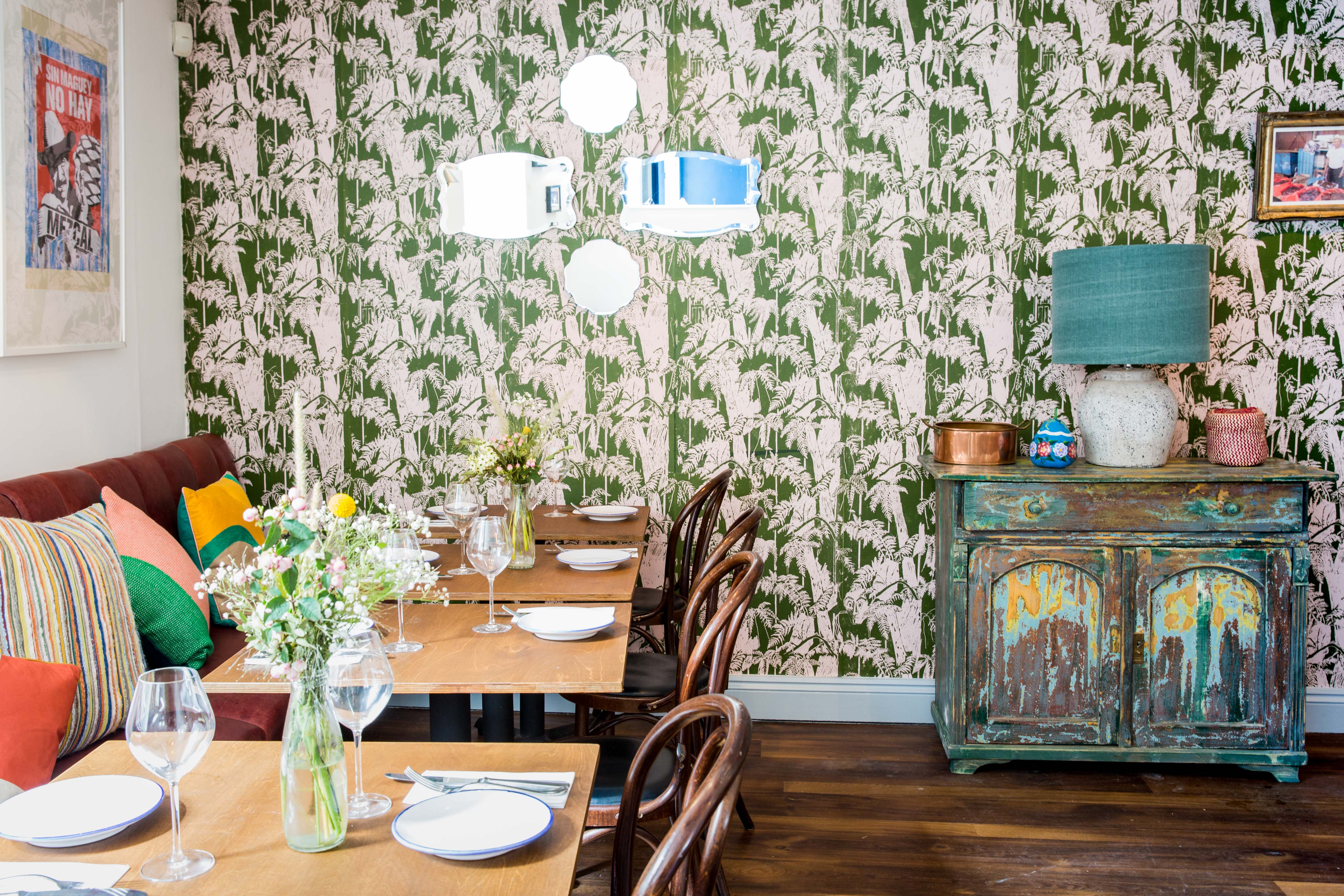 Agave dining room with vibrant decor, ideal for intimate events and gatherings.