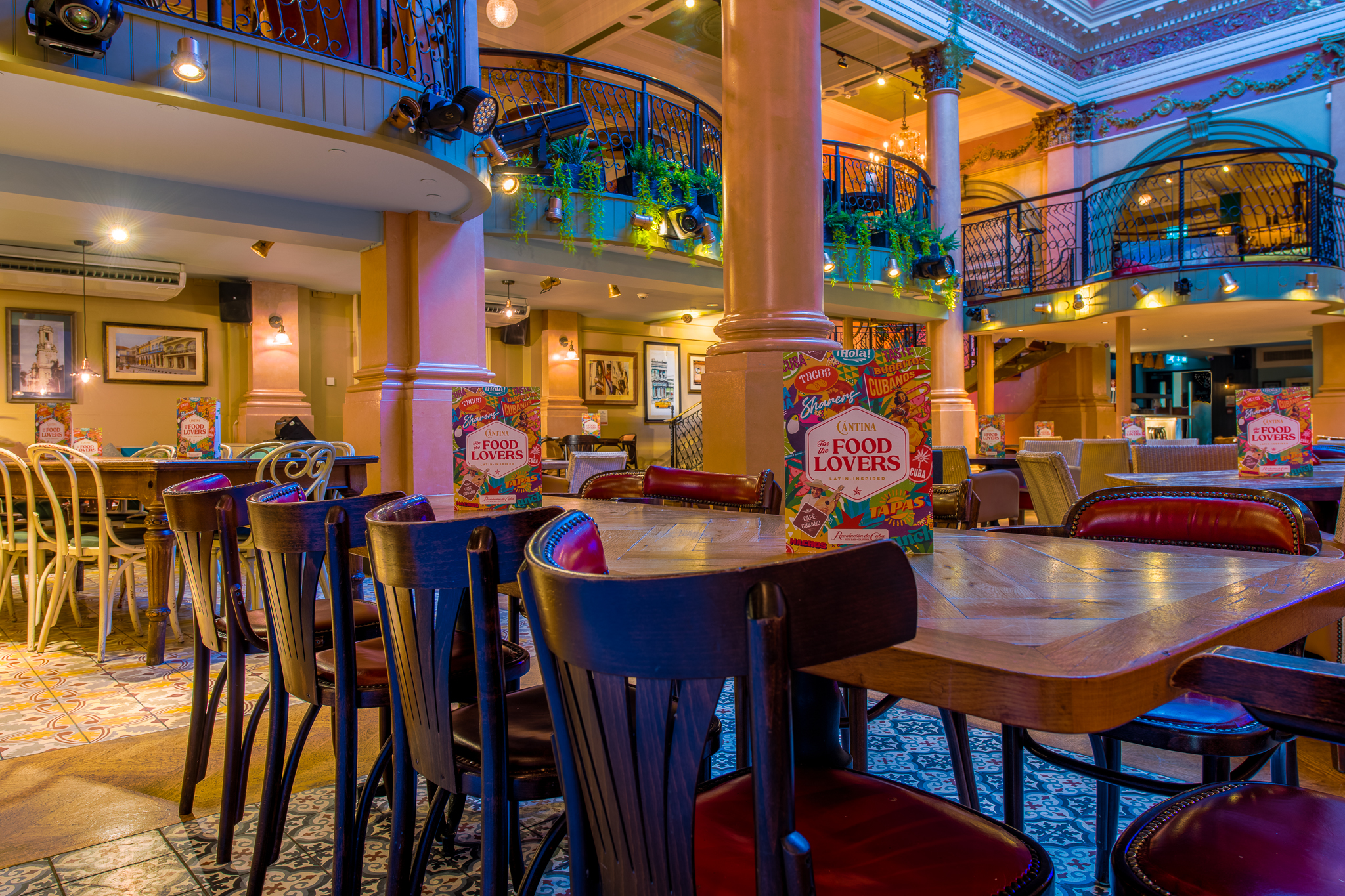 Vibrant Revolution De Cuba Belfast venue with colorful decor for casual events and gatherings.