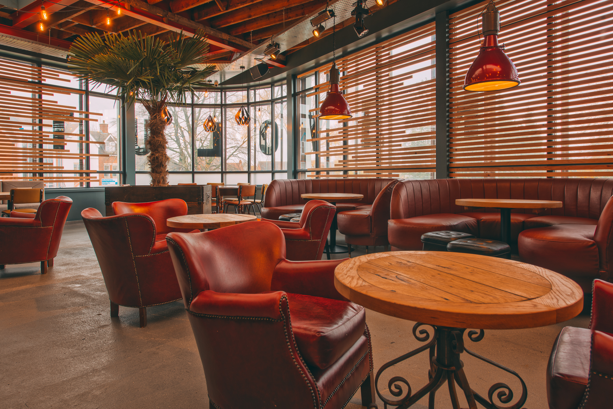 Stylish lounge area with warm lighting for networking events at Revolution Solihull.