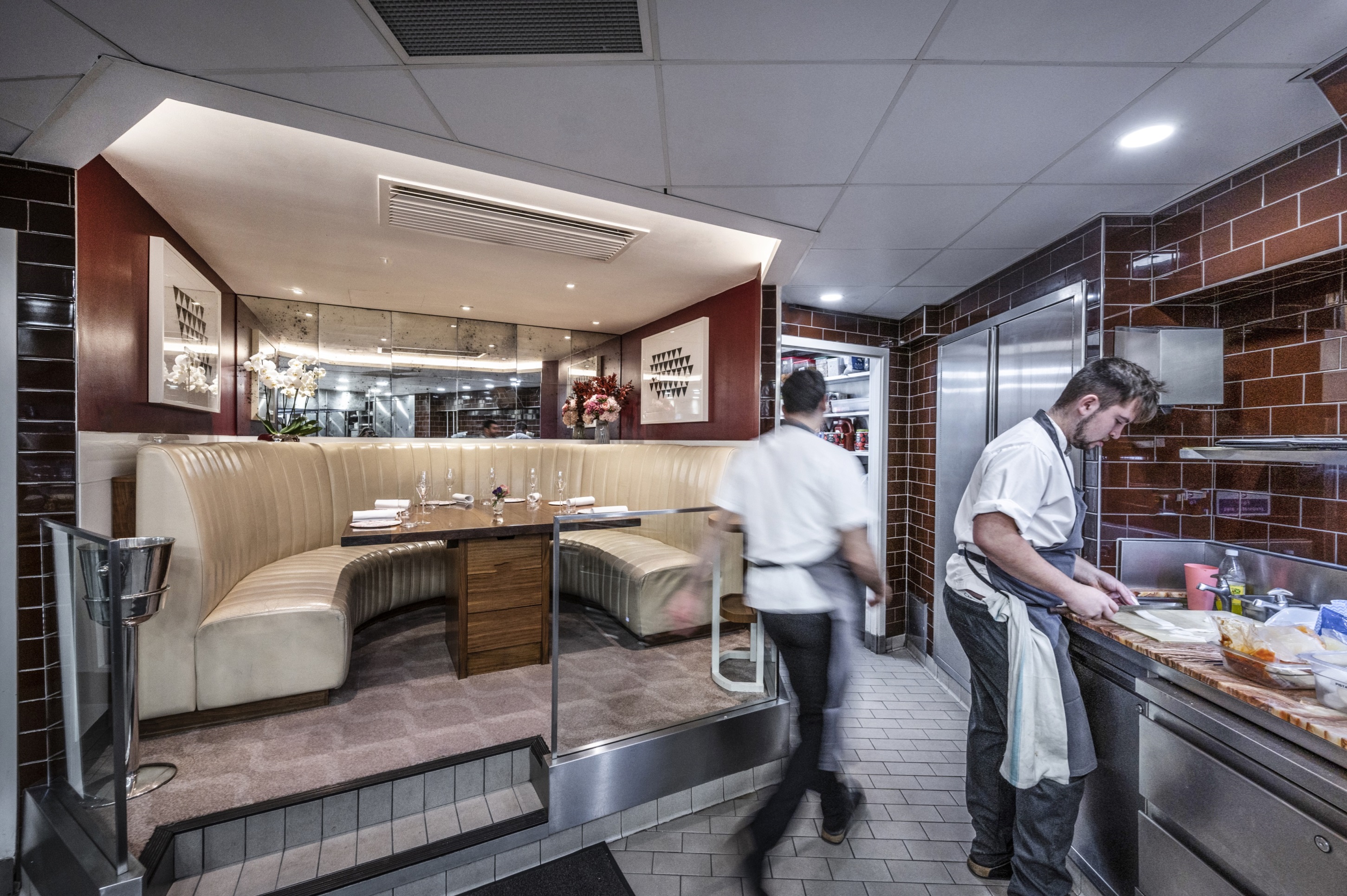 Stylish kitchen table in Petrus, perfect for intimate corporate dinners and gatherings.