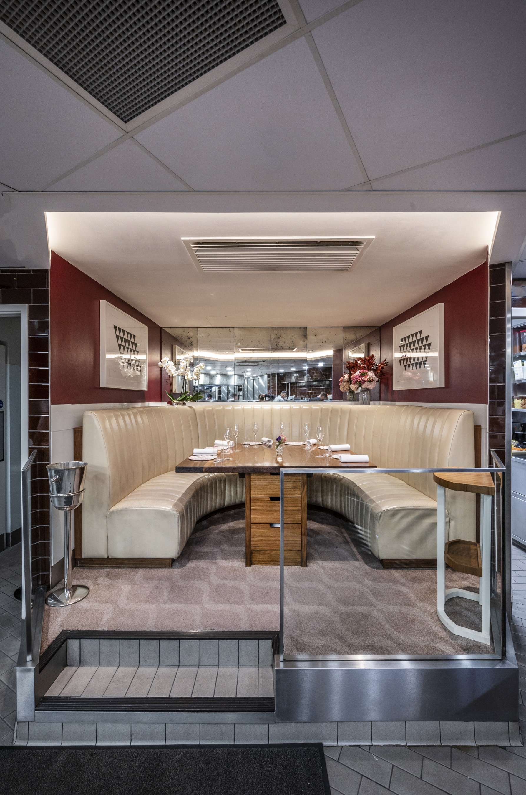 Stylish kitchen table in semi-private dining area for intimate meetings and small events.