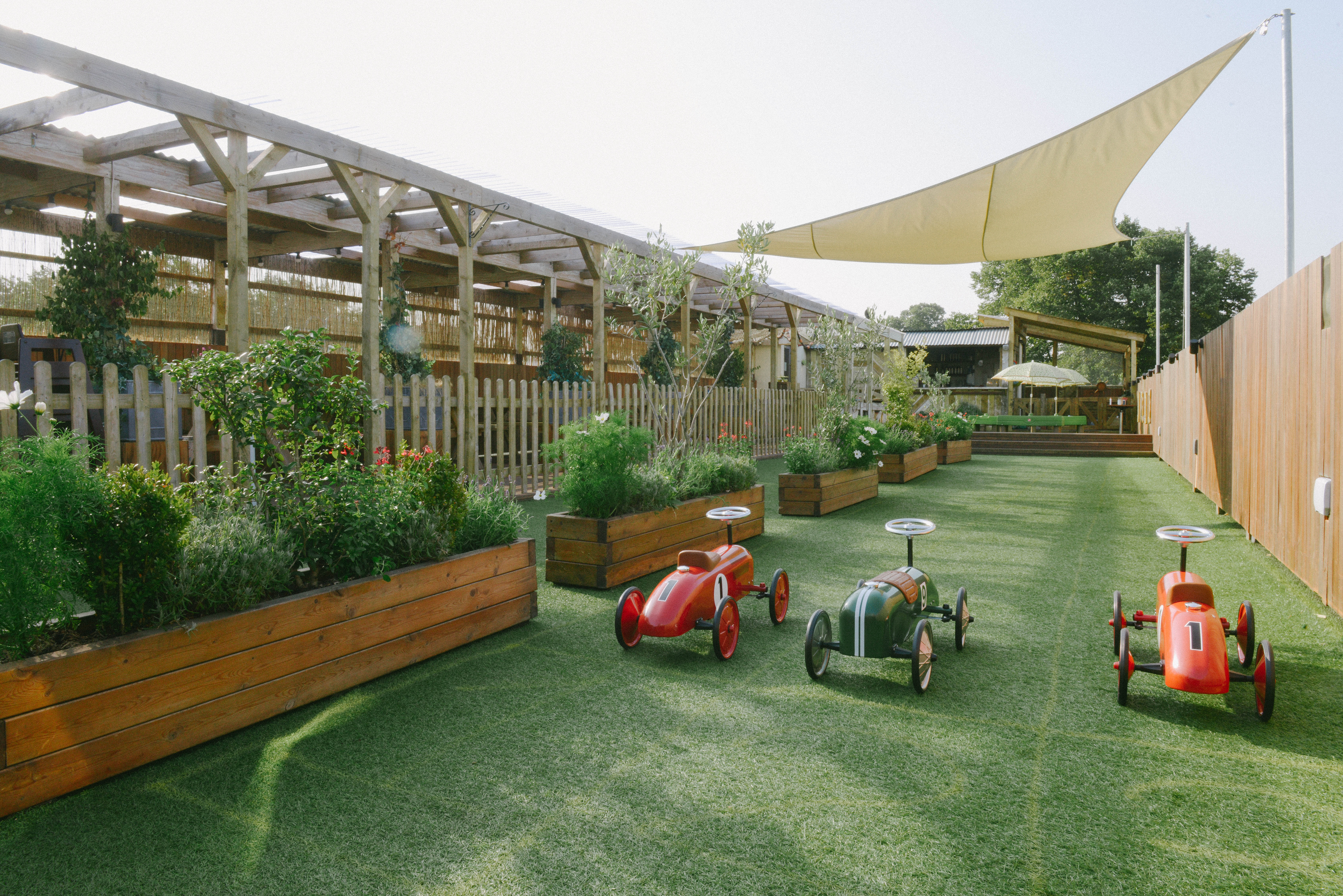 Chiswick Roof Terrace with lush greenery, perfect for family-friendly events and gatherings.