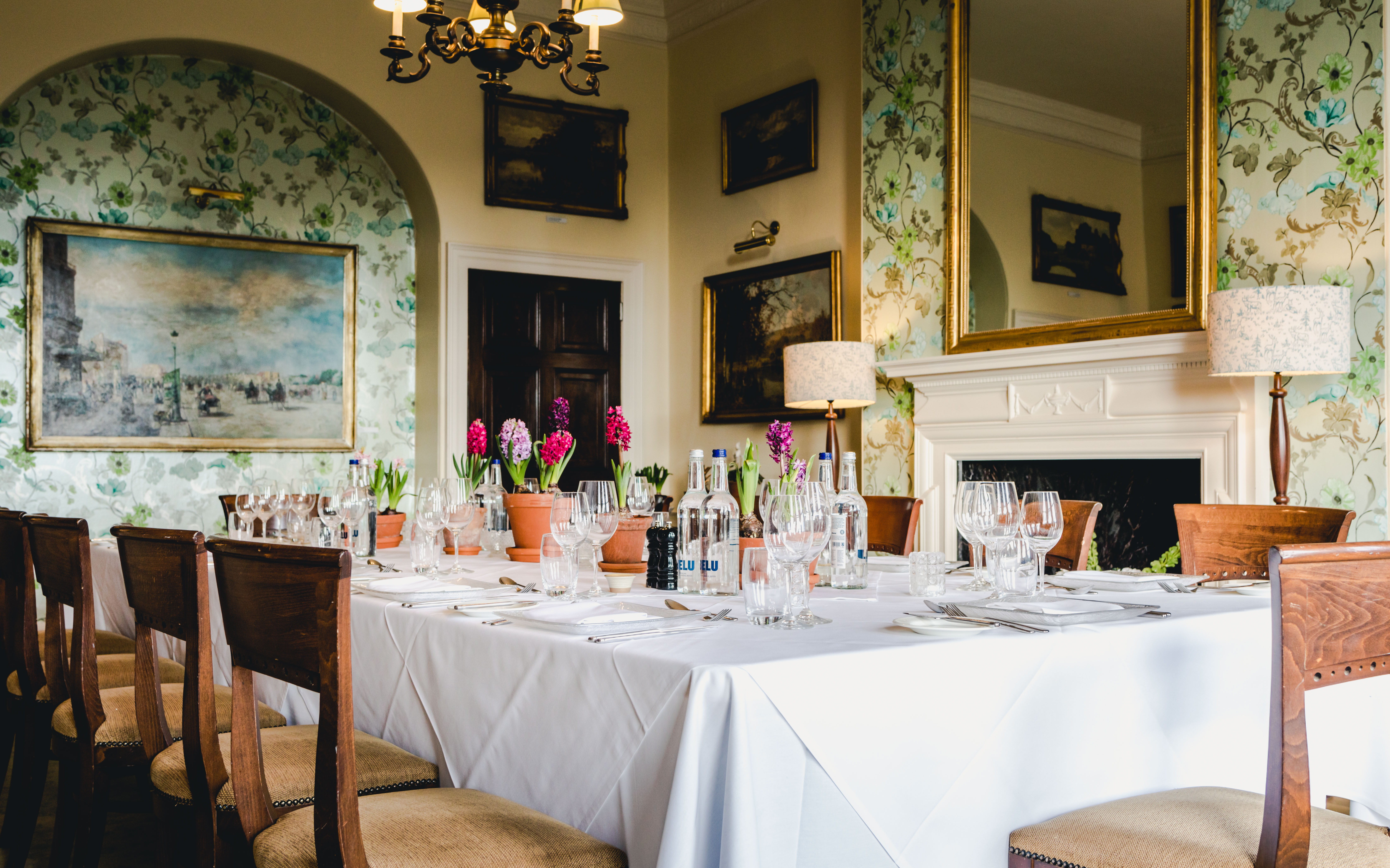 Elegant dining table in floral-themed Deer Park Country House for intimate gatherings.