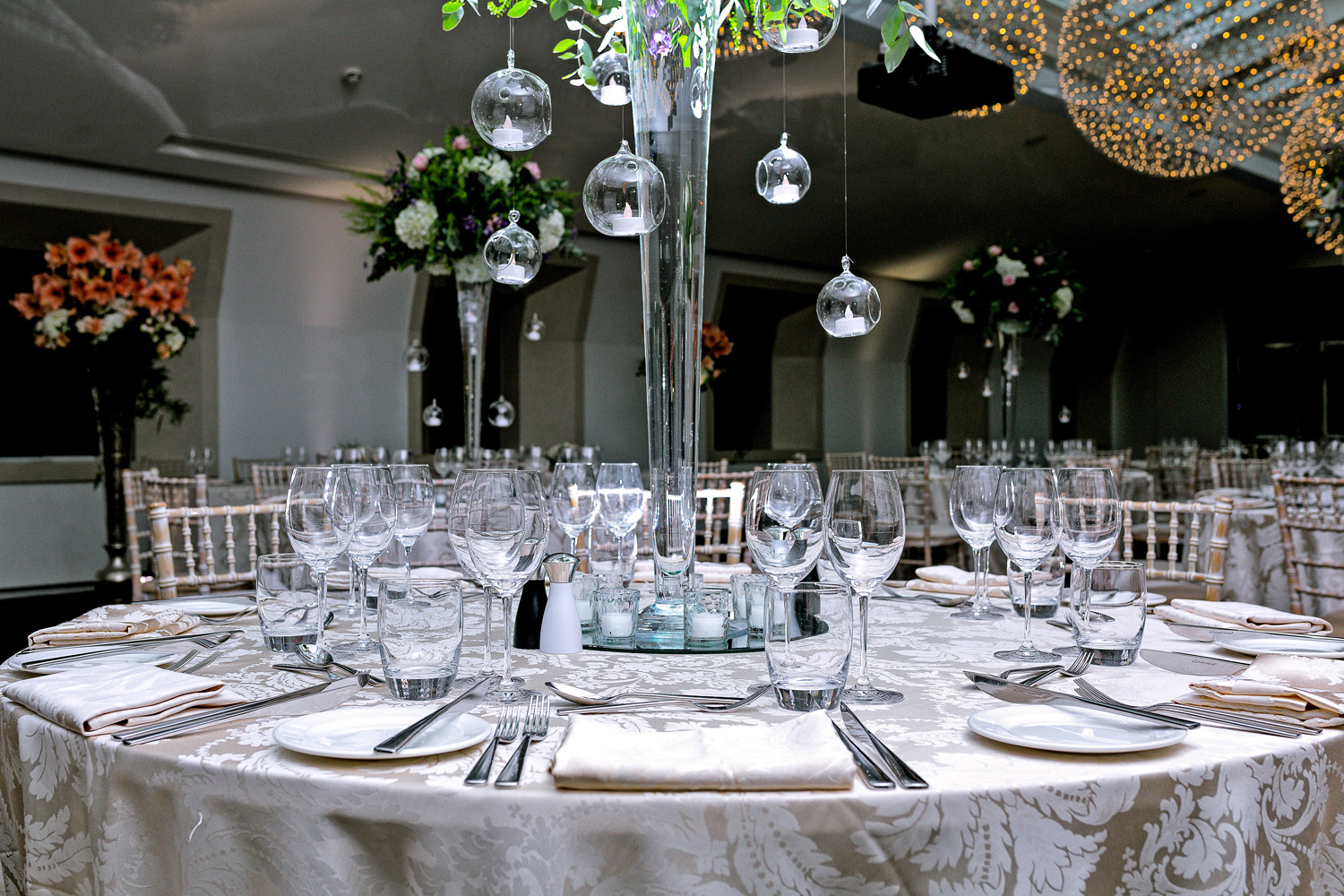 Elegant wedding banquet table with floral centerpieces at 30 Euston Square.