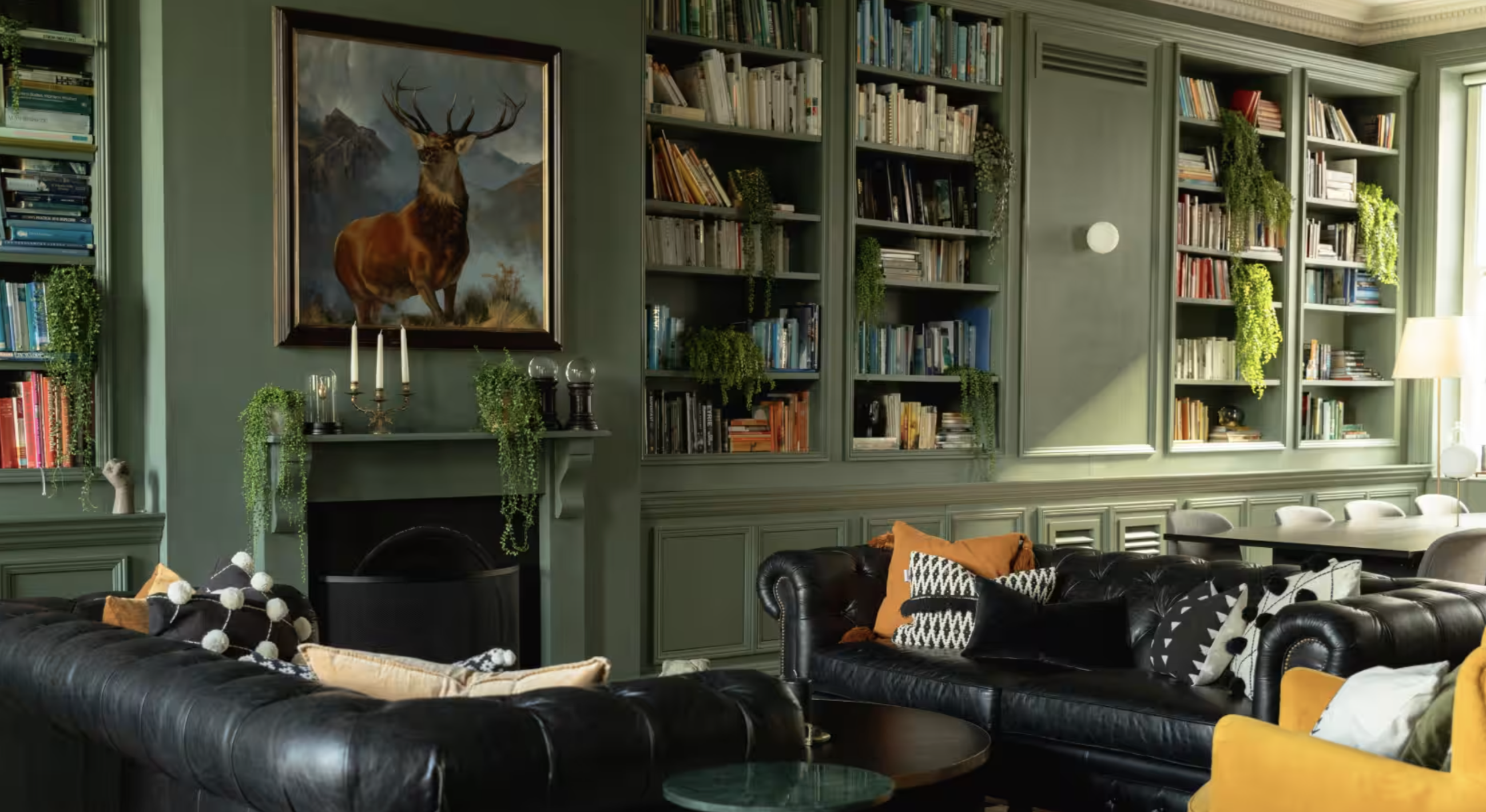 Cozy lounge in The Library, featuring leather seating for networking events and meetings.