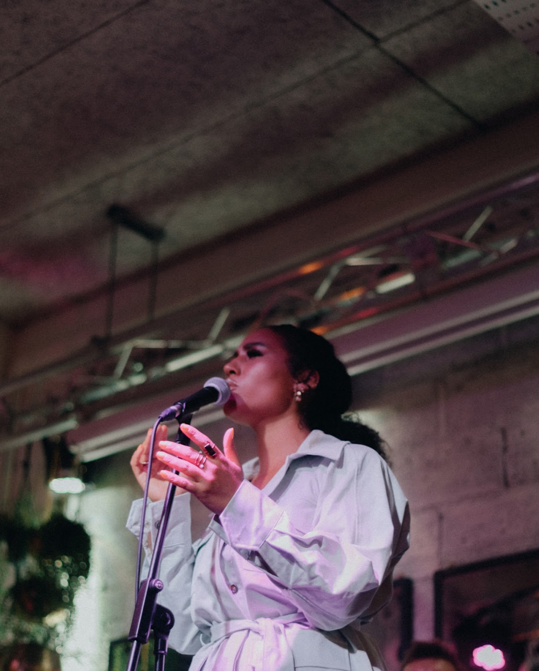 Live performance at The Hall in Kindred with engaging ambiance and effective lighting.