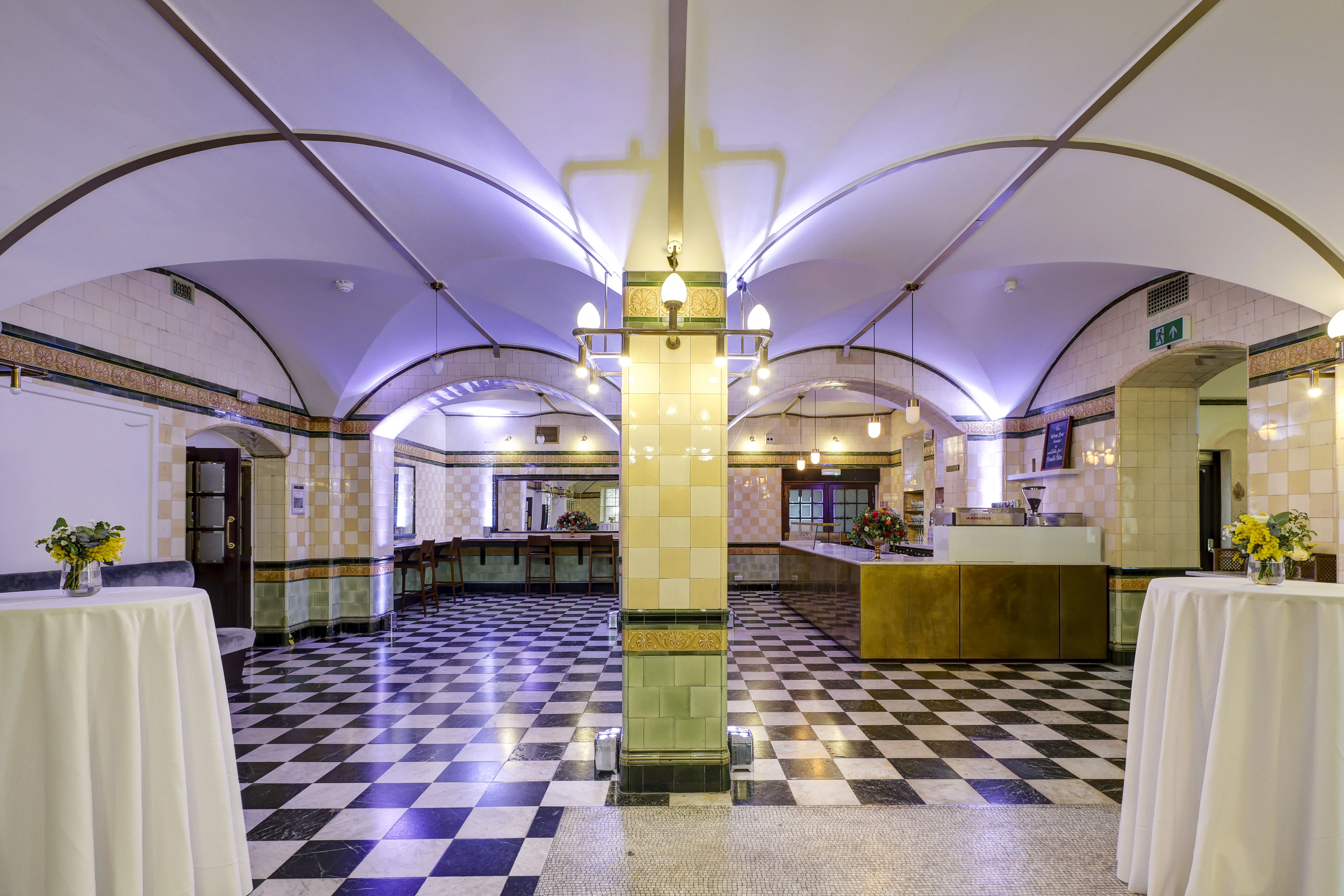 Café Duke event venue with arched ceilings, perfect for networking and cocktail receptions.