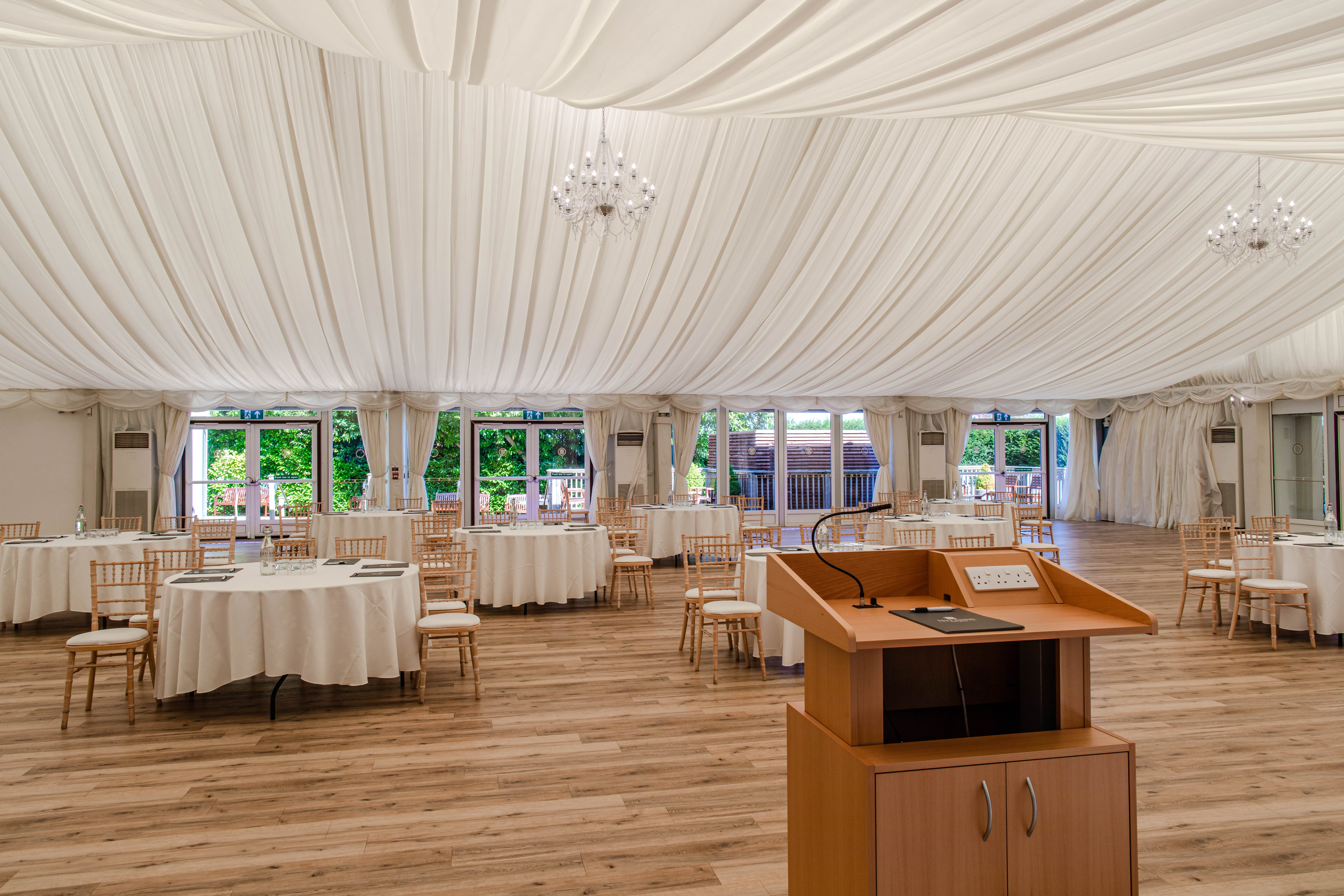 Grand Pavilion in Hylands Estate, elegant venue with draped ceilings for events and meetings.