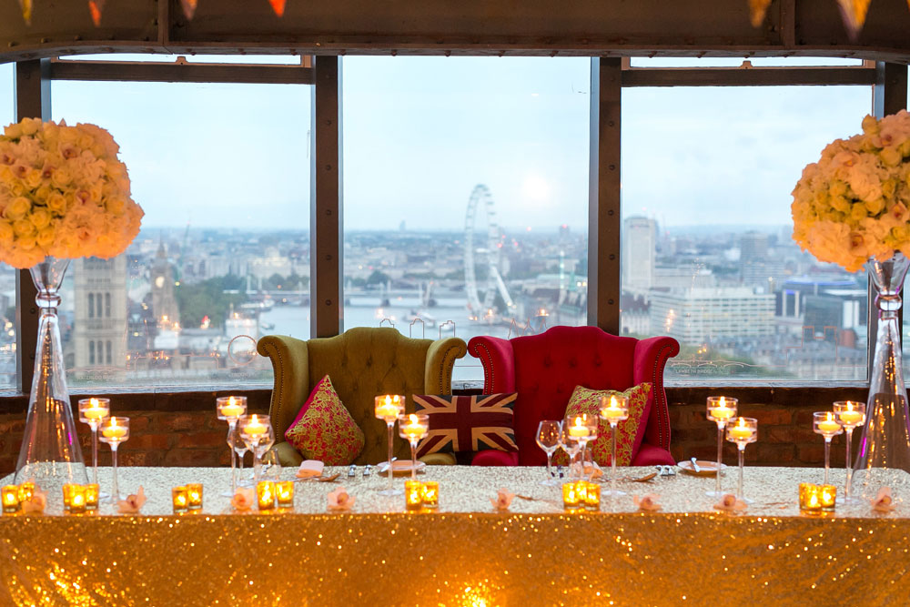 Elegant wedding reception at Skyloft, London with skyline view and luxurious décor.
