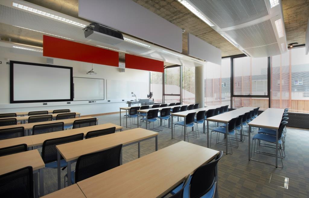 Modern large classroom with flexible seating for meetings and events at ARU Venue Hire.