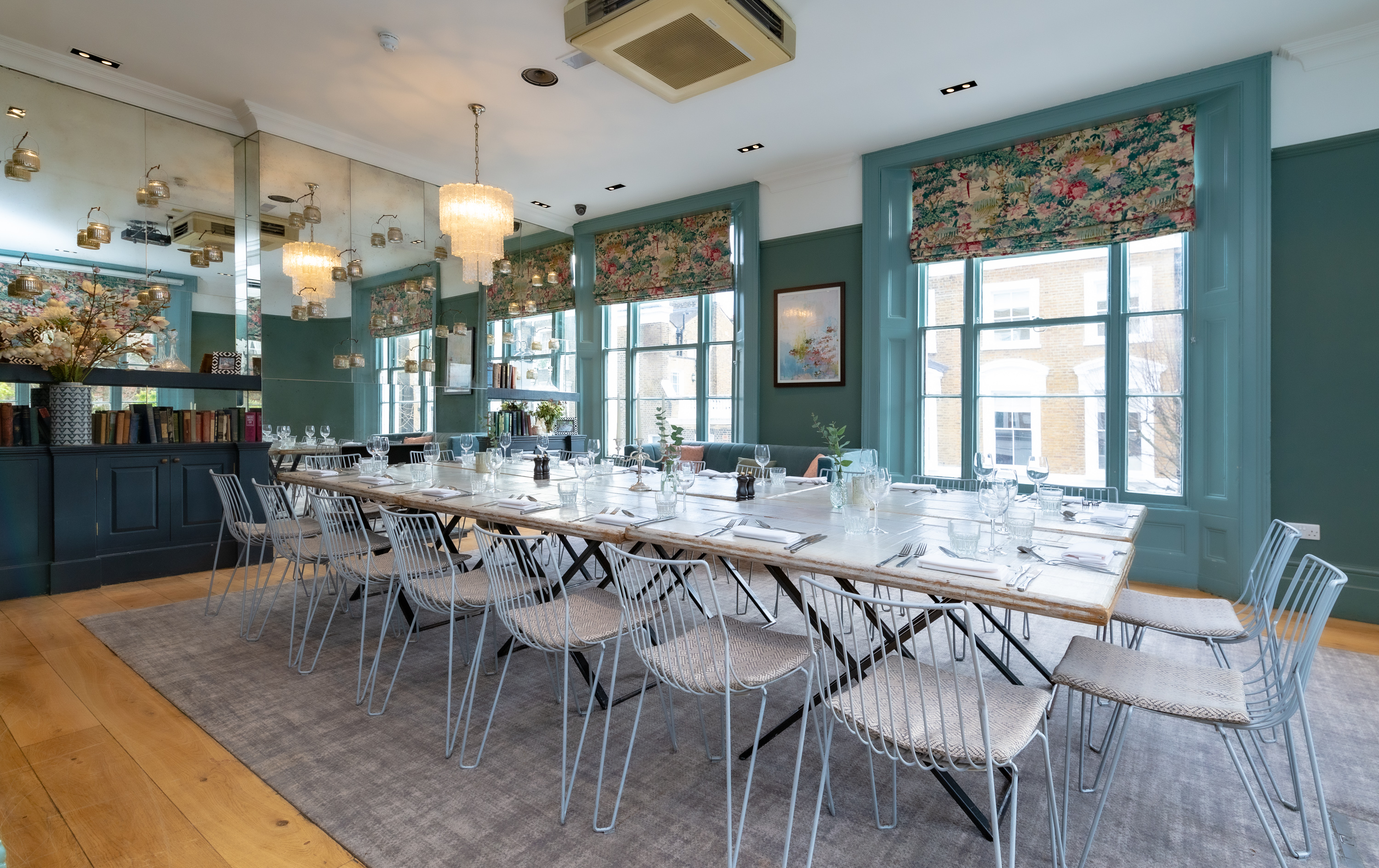Oakley room at The Phene: elegant meeting space with natural light for workshops.